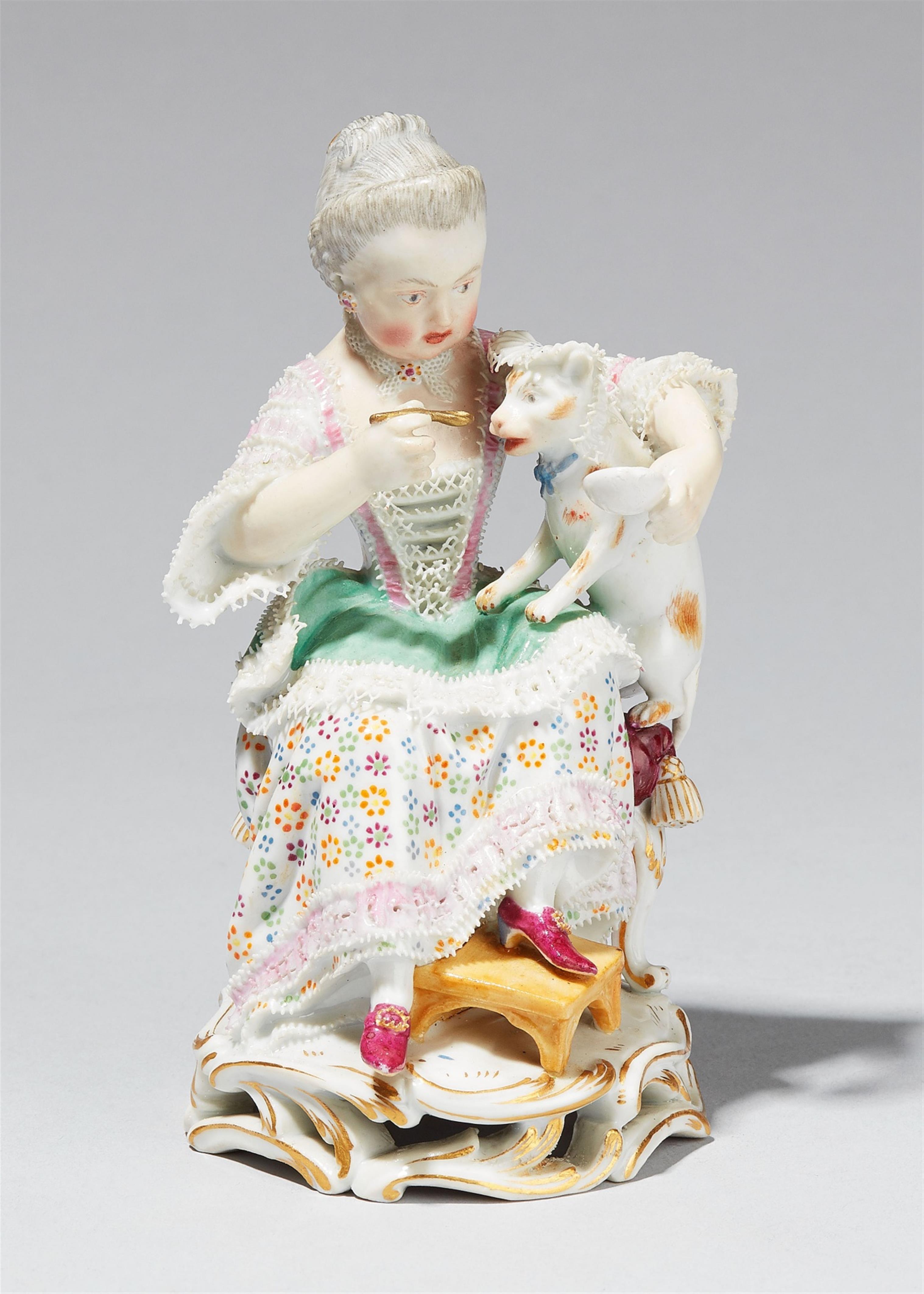 A Meissen porcelain model of a girl feeding a cat - image-1