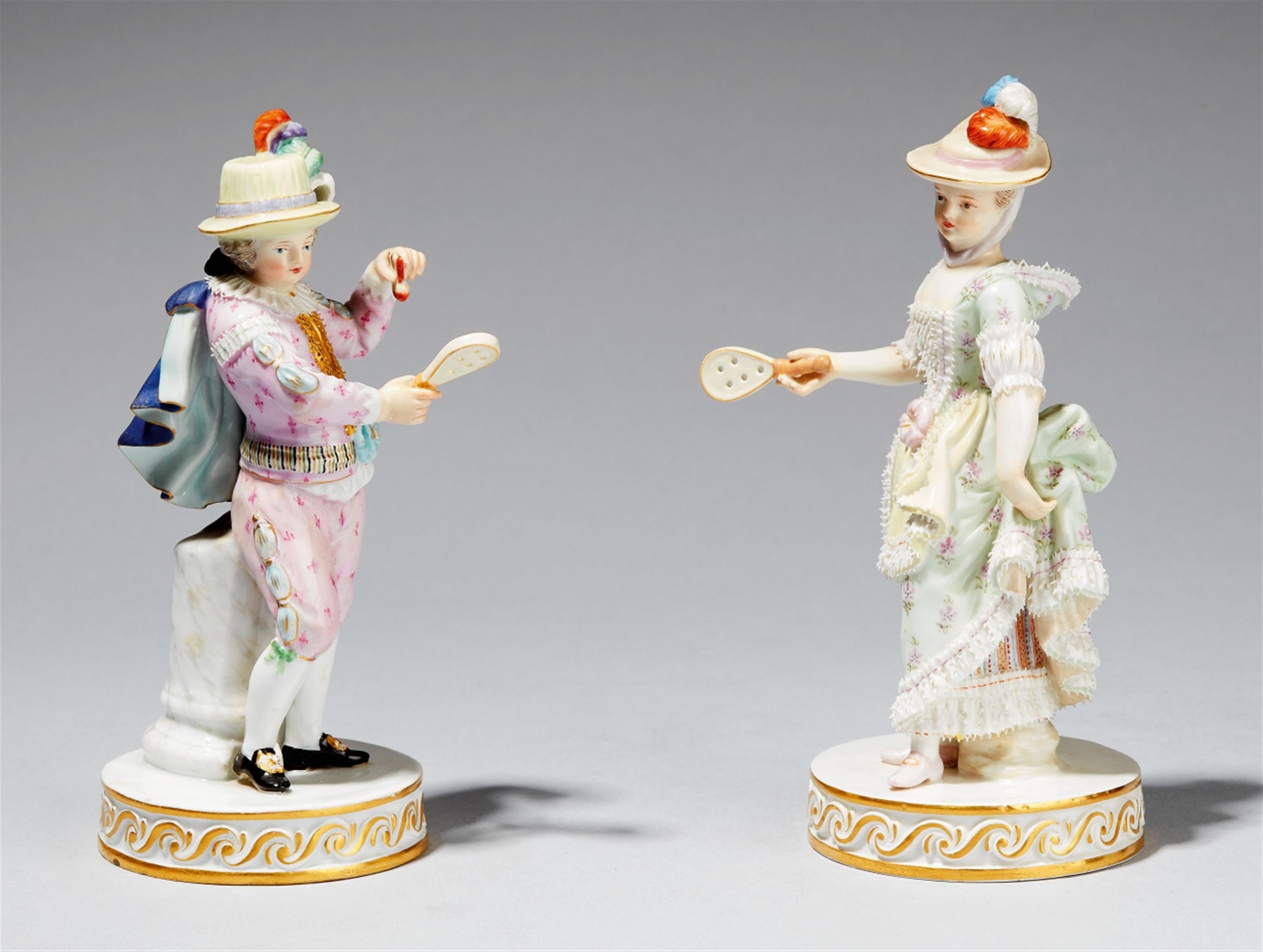 Two Meissen porcelain figures of a boy and a girl playing badminton - image-1