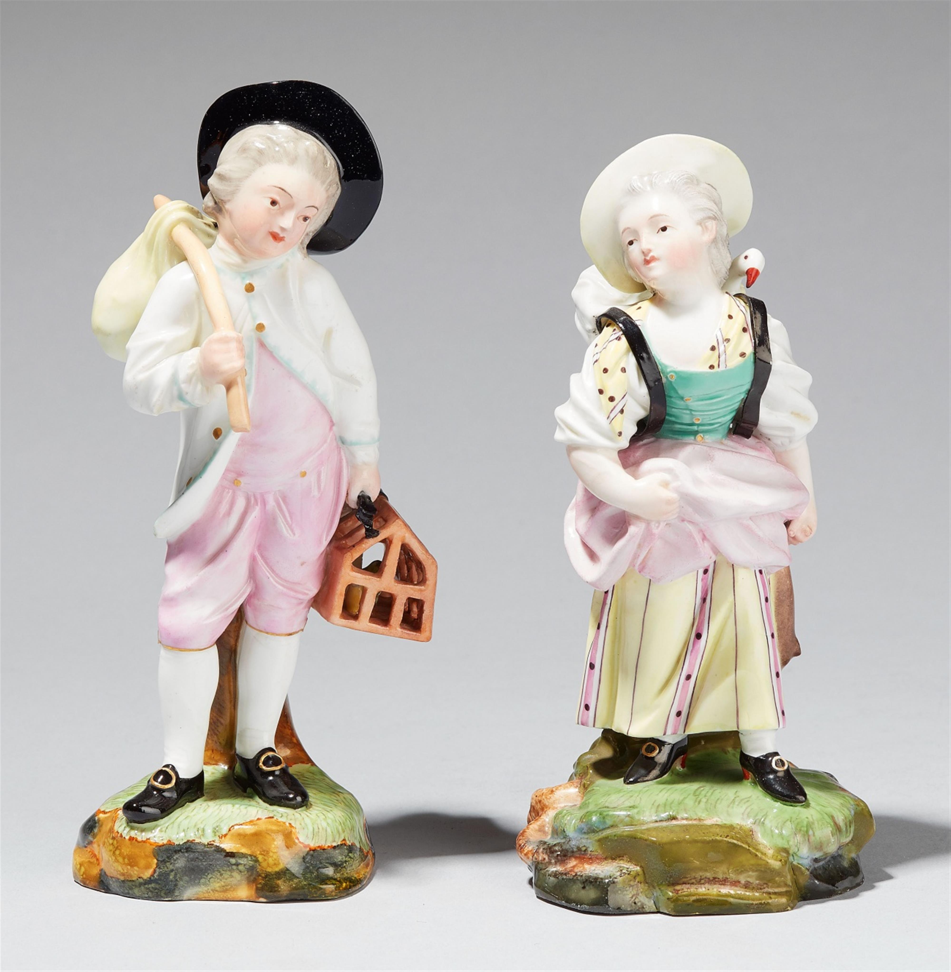 A pair of Höchst porcelain figures of children at the market - image-1