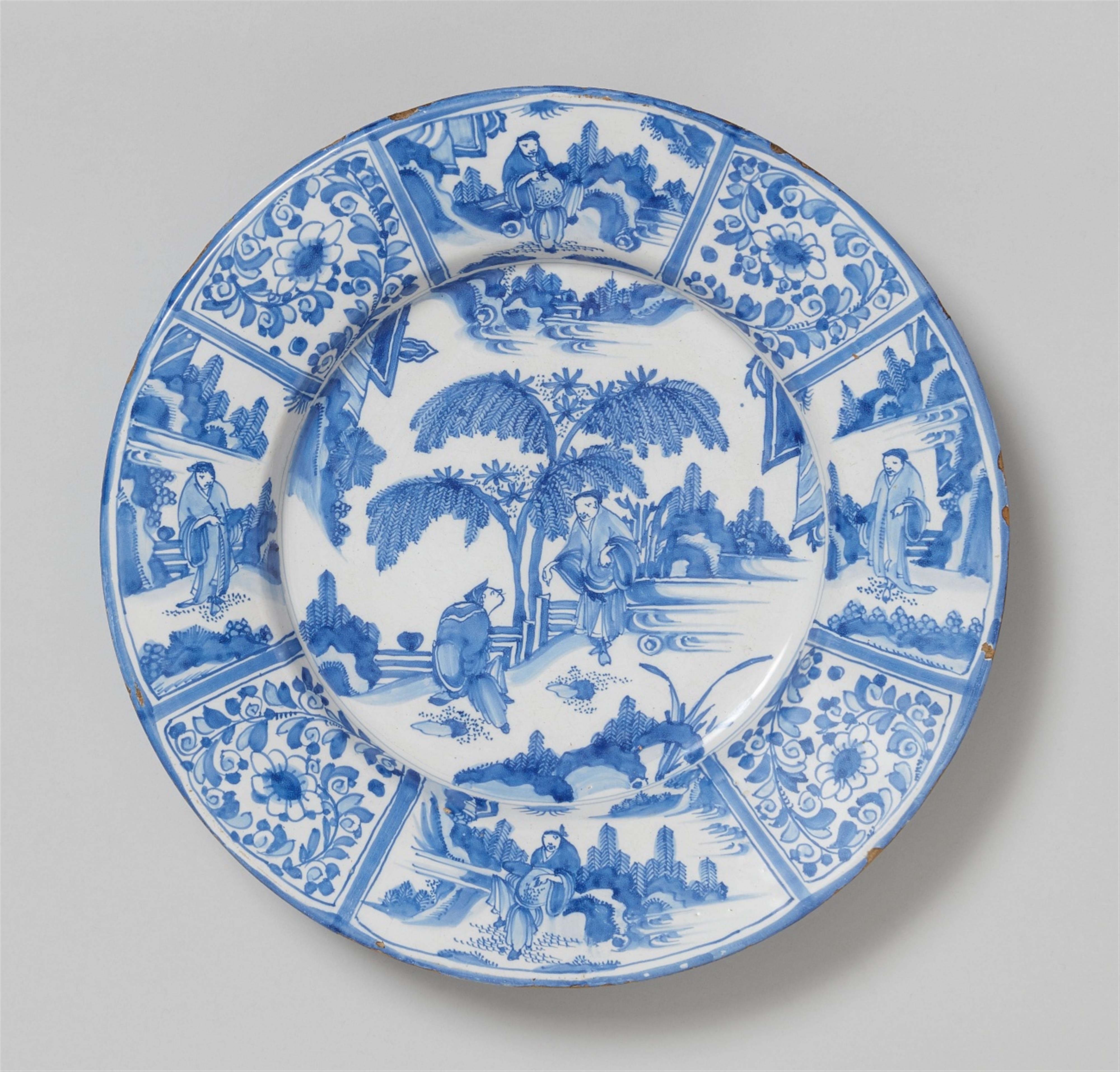 A blue and white faience dish with chinoiserie decor - image-1