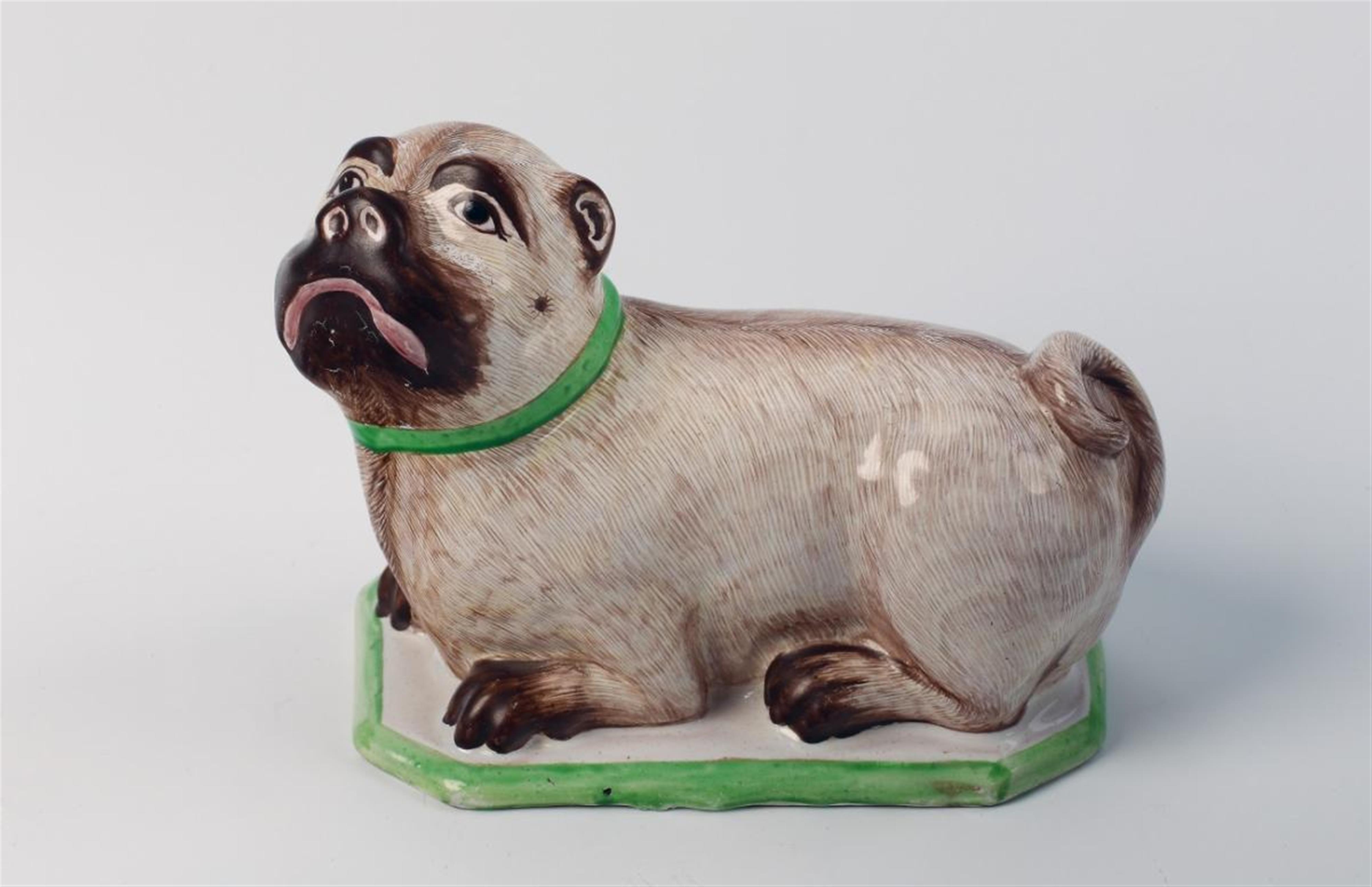 A rare German faience model of a recumbent pug dog - image-2