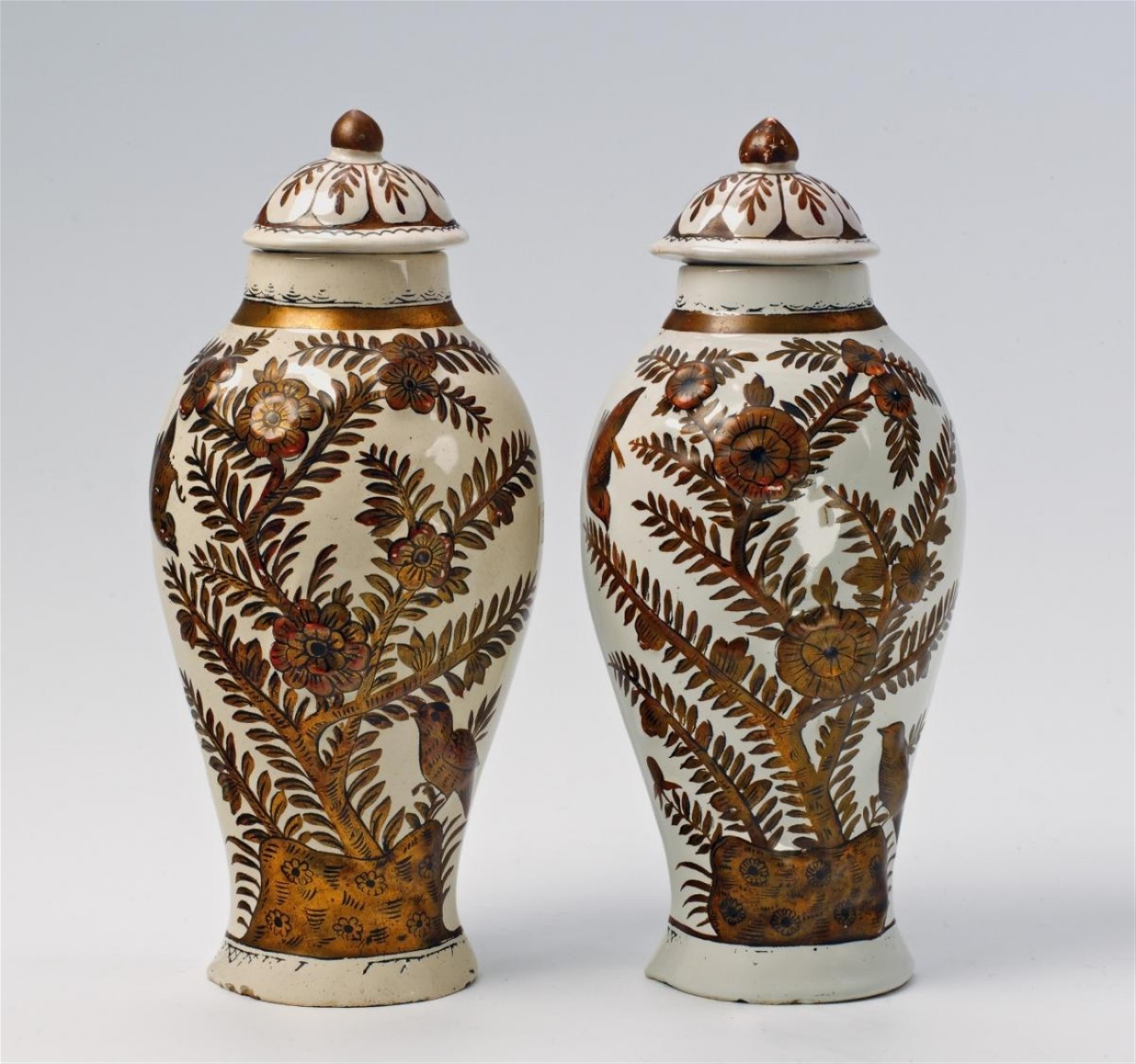 A pair of Ansbach faience vases and covers with lacquer decor. - image-1