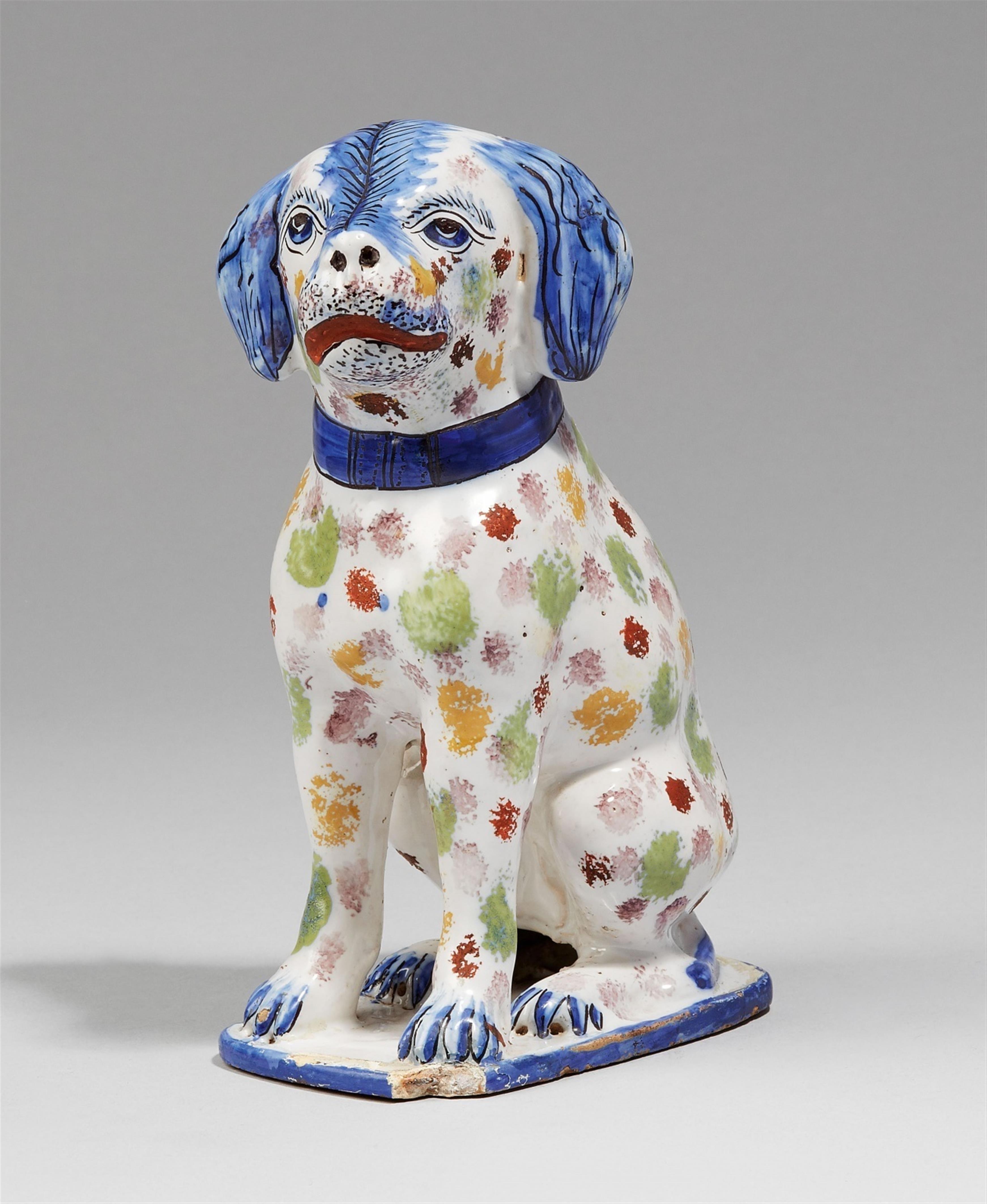 A faience model of a seated spaniel - image-1