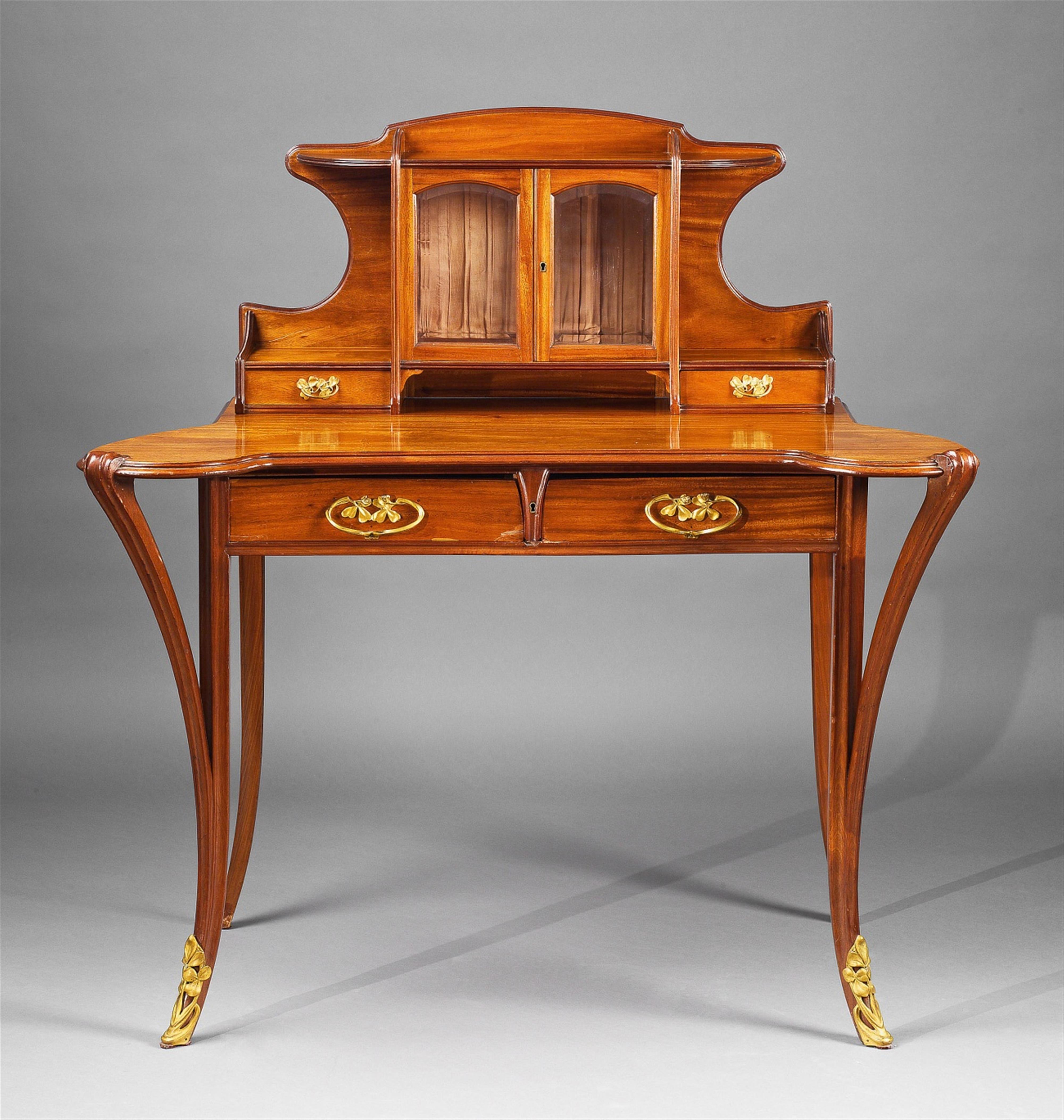 An ormolu-mounted Louis Majorelle ladies mahogany writing desk - image-1