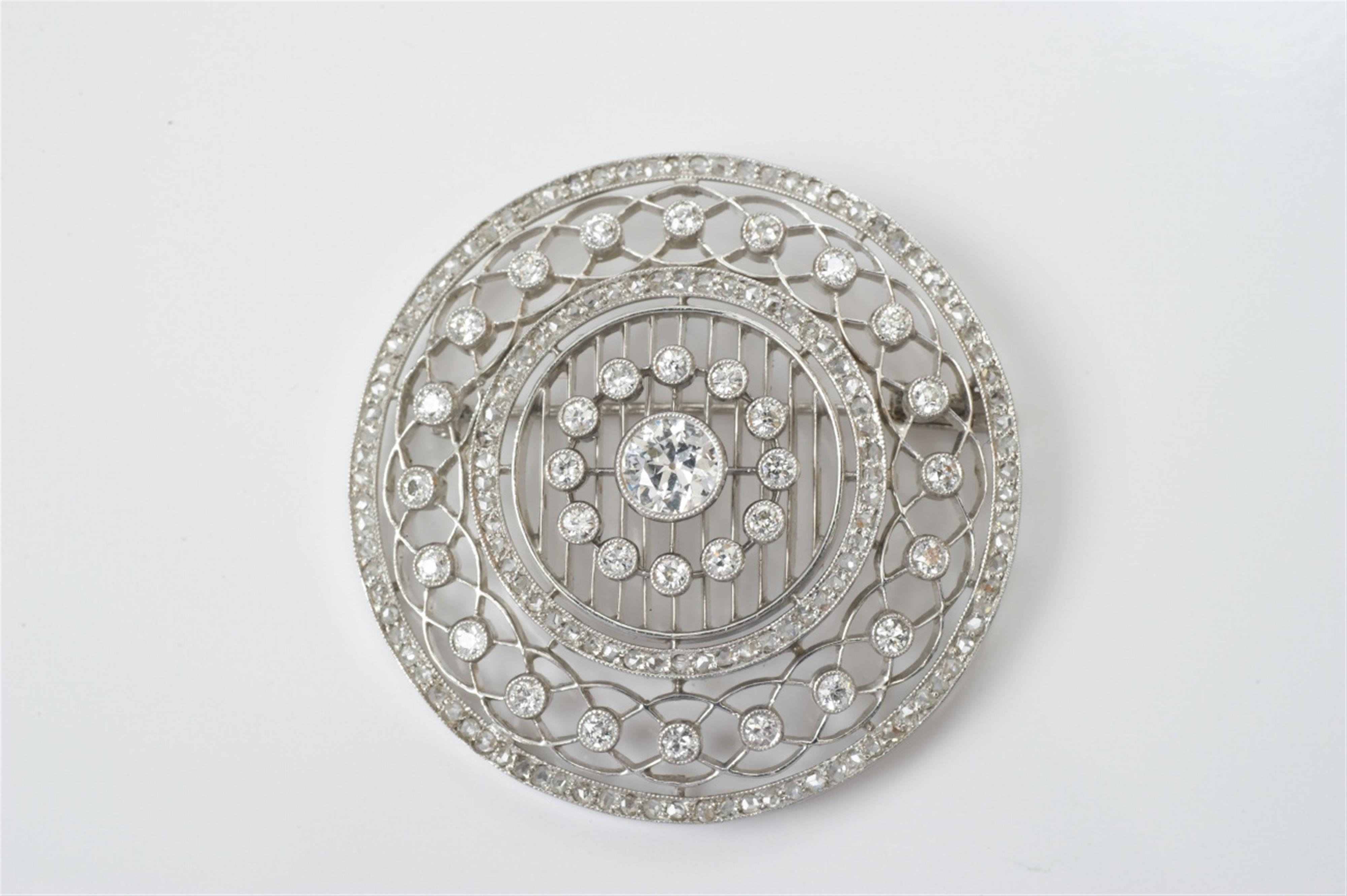 An 18k white gold and diamond Belle Epoque brooch - image-1