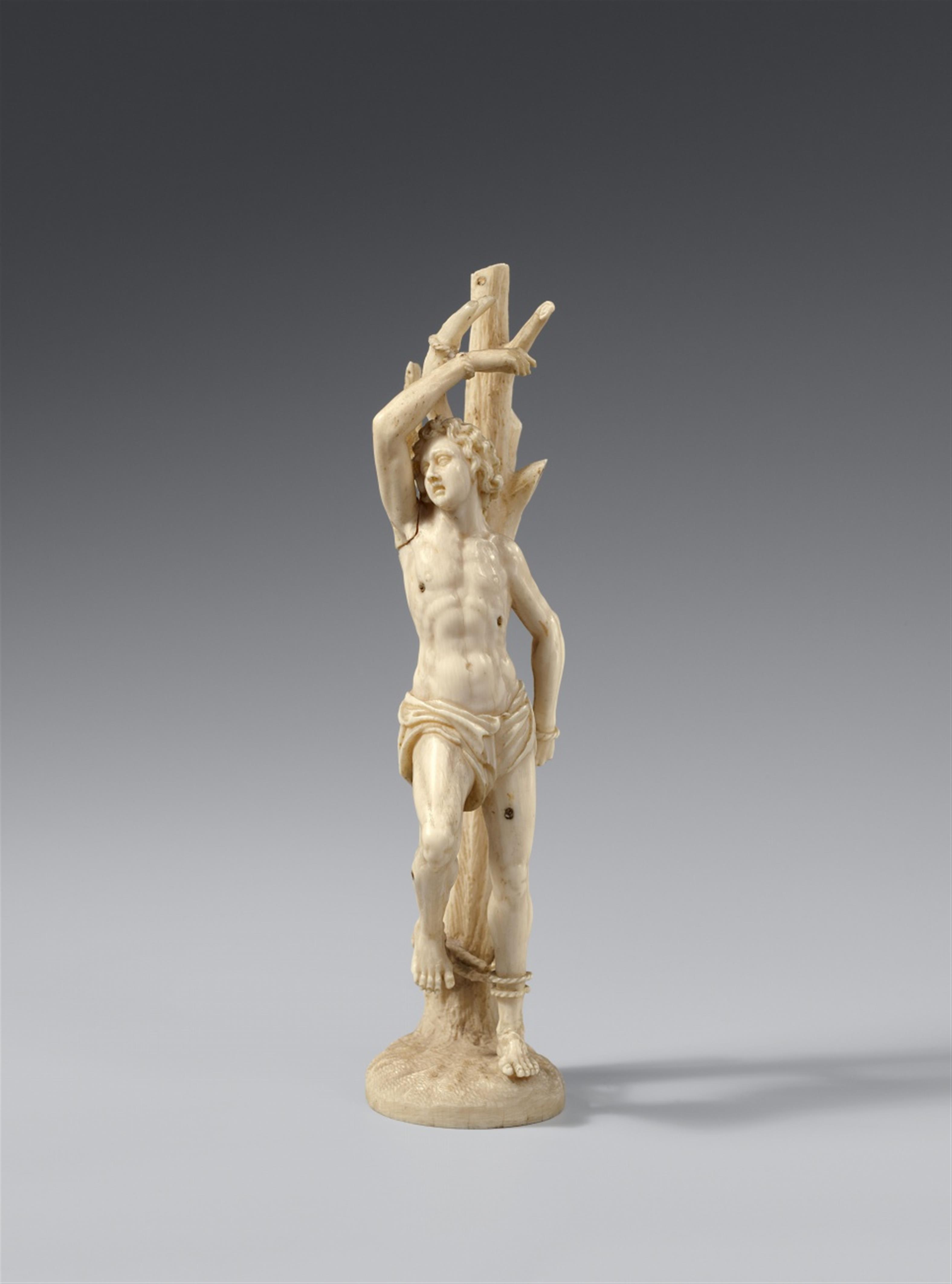 Probably German late 17th century - A probably German late 17th century carved ivory figure of Saint Sebastian - image-1
