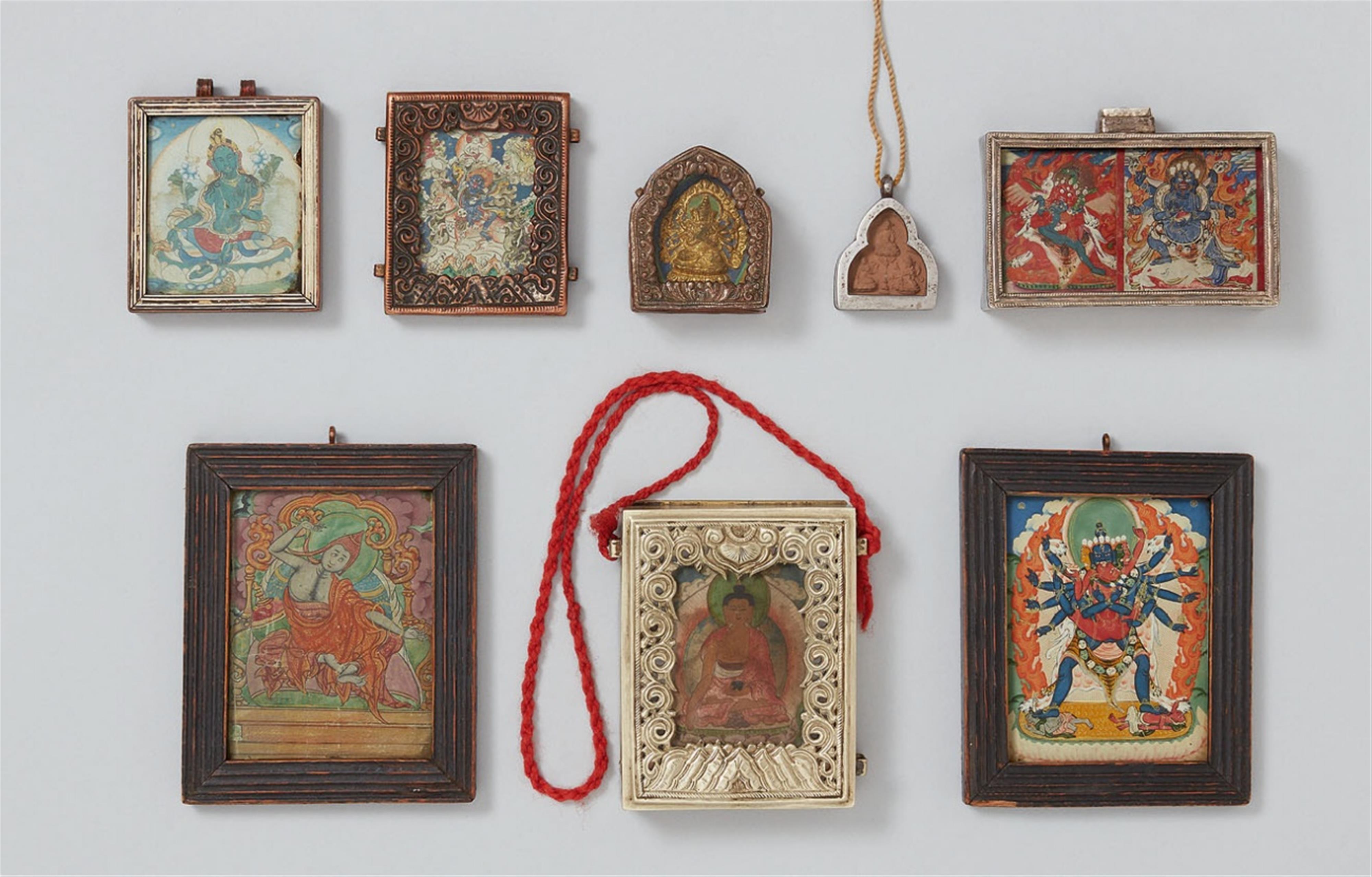 Six Tibetan and Mongolian metal amulet boxes (ga´u) - image-1