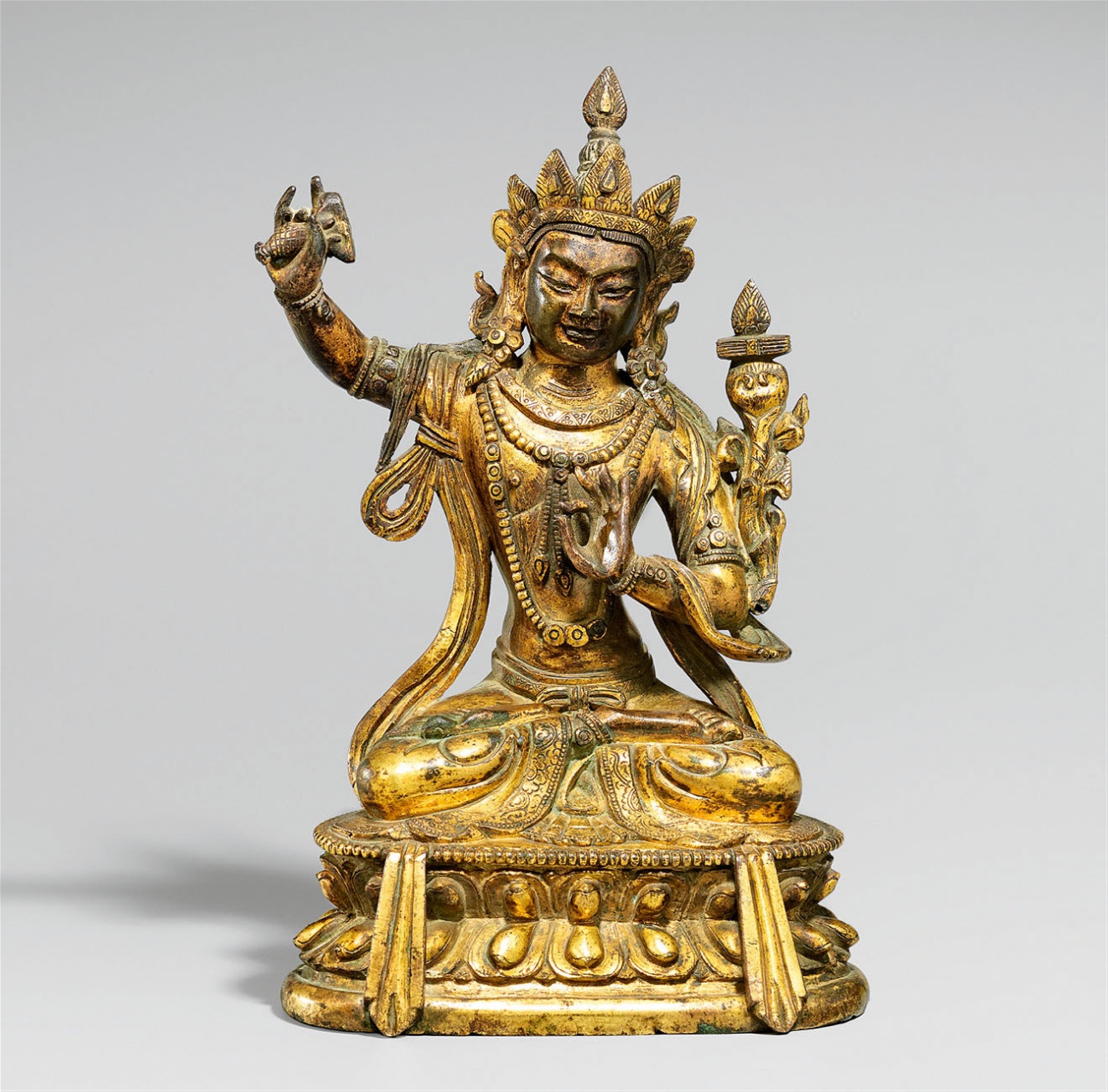 A Sinotibetan gilt bronze figure of Manjushri. 18th/19th century - image-1