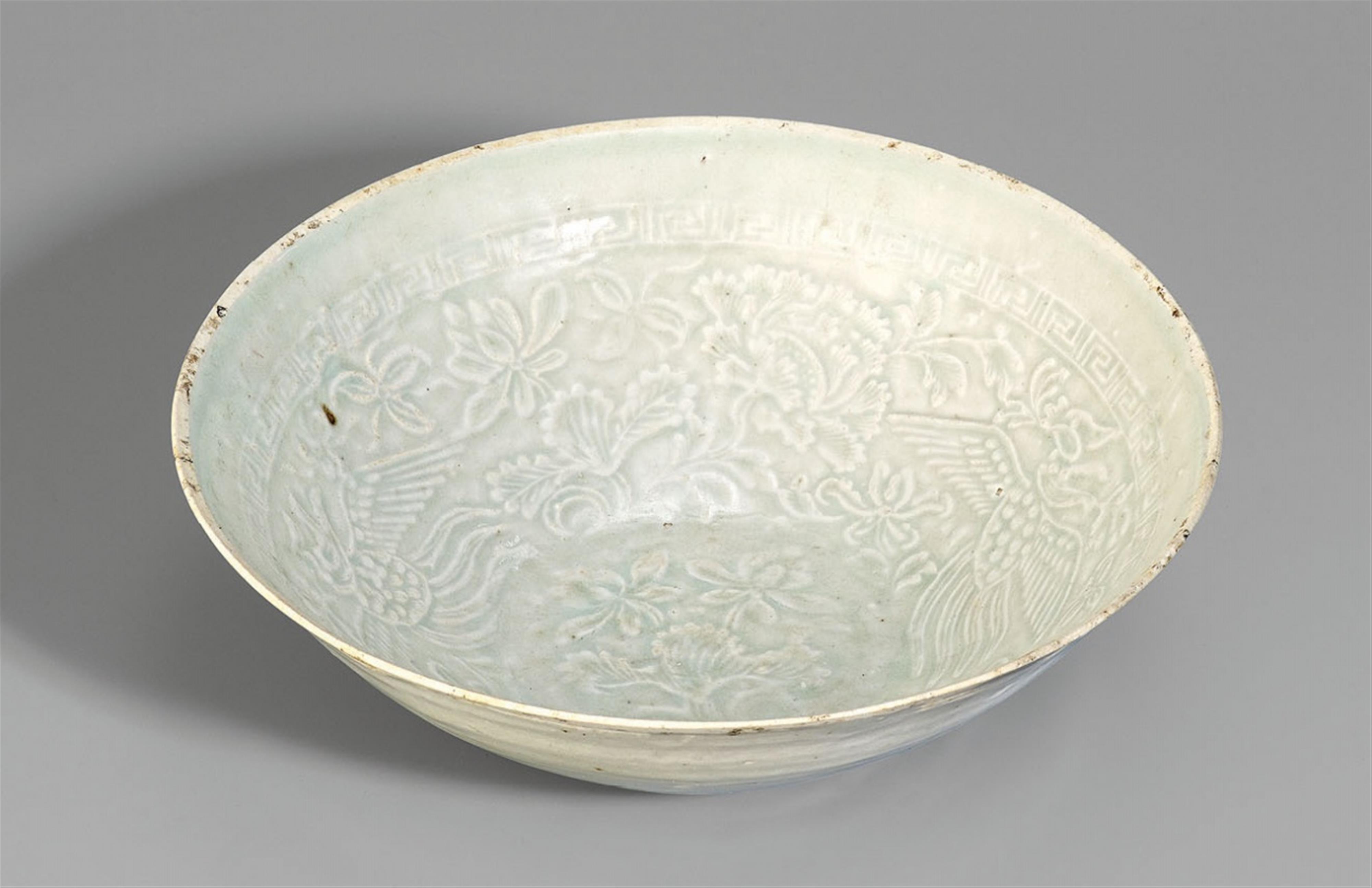 A qingbai moulded double phoenix bowl. Song dynasty (907-1279) - image-1
