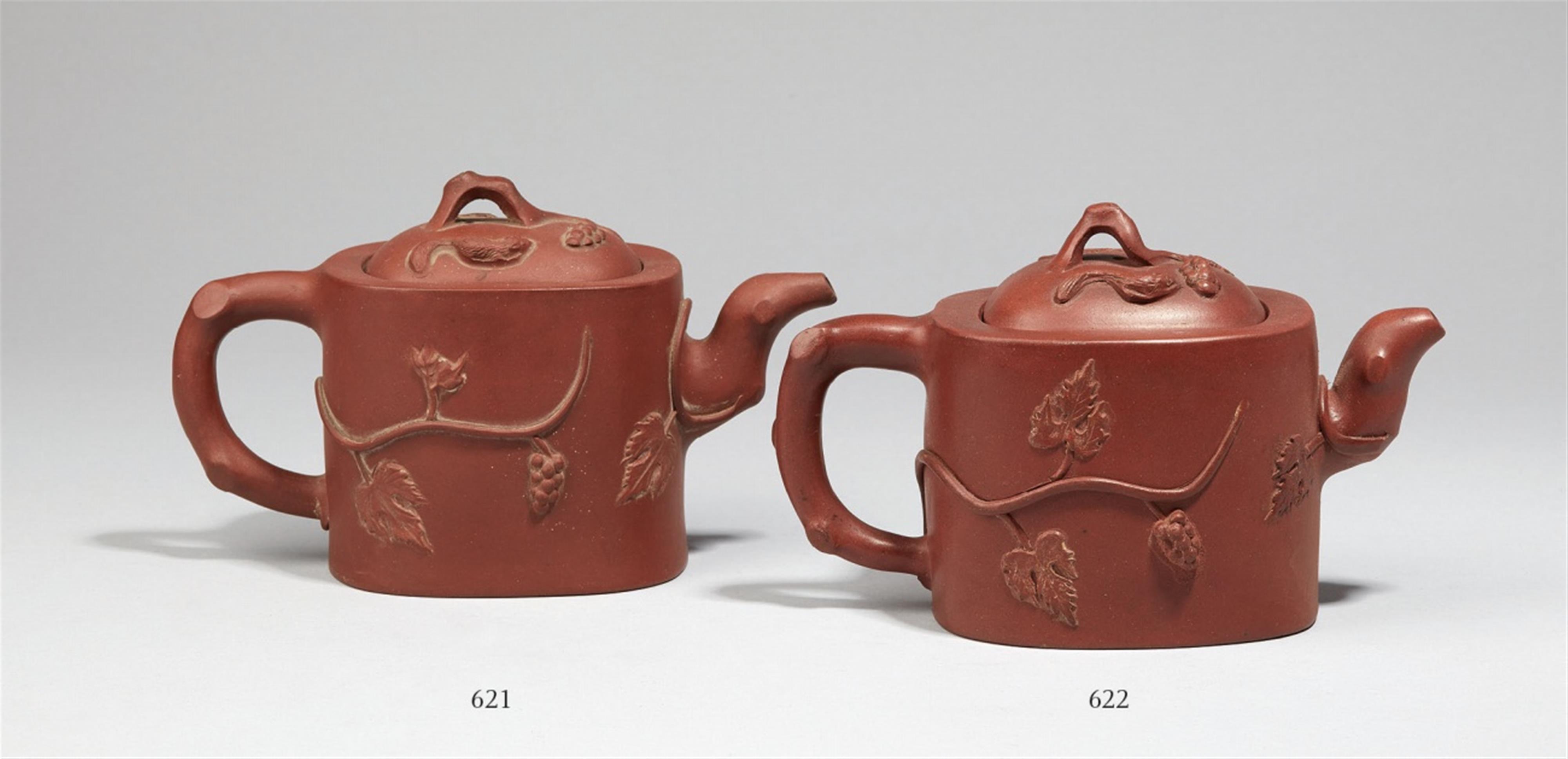 A Yixing teapot with grape vine in relief. Yixing - image-1