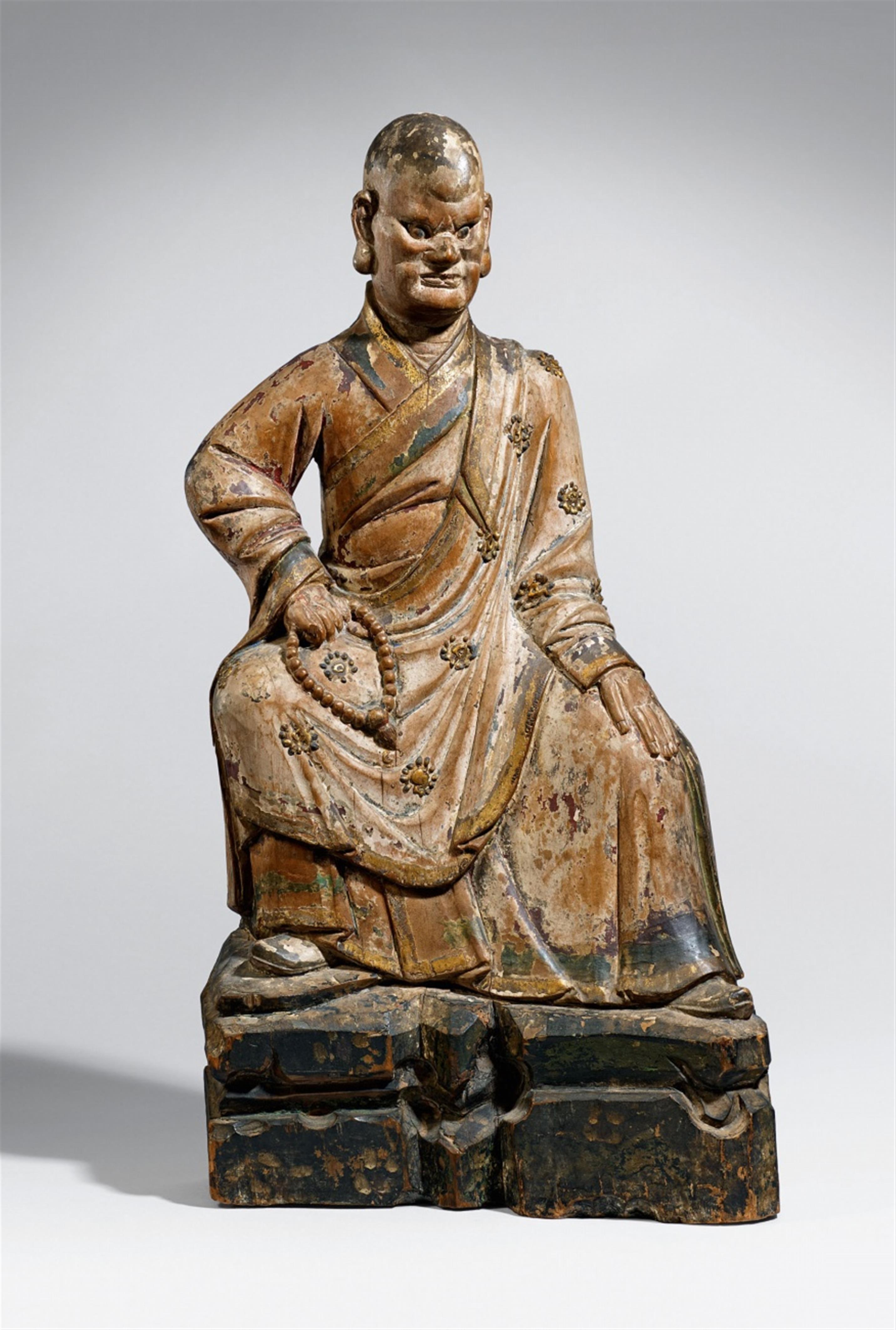 A painted wood figure of a luohan. Ming dynasty - image-1