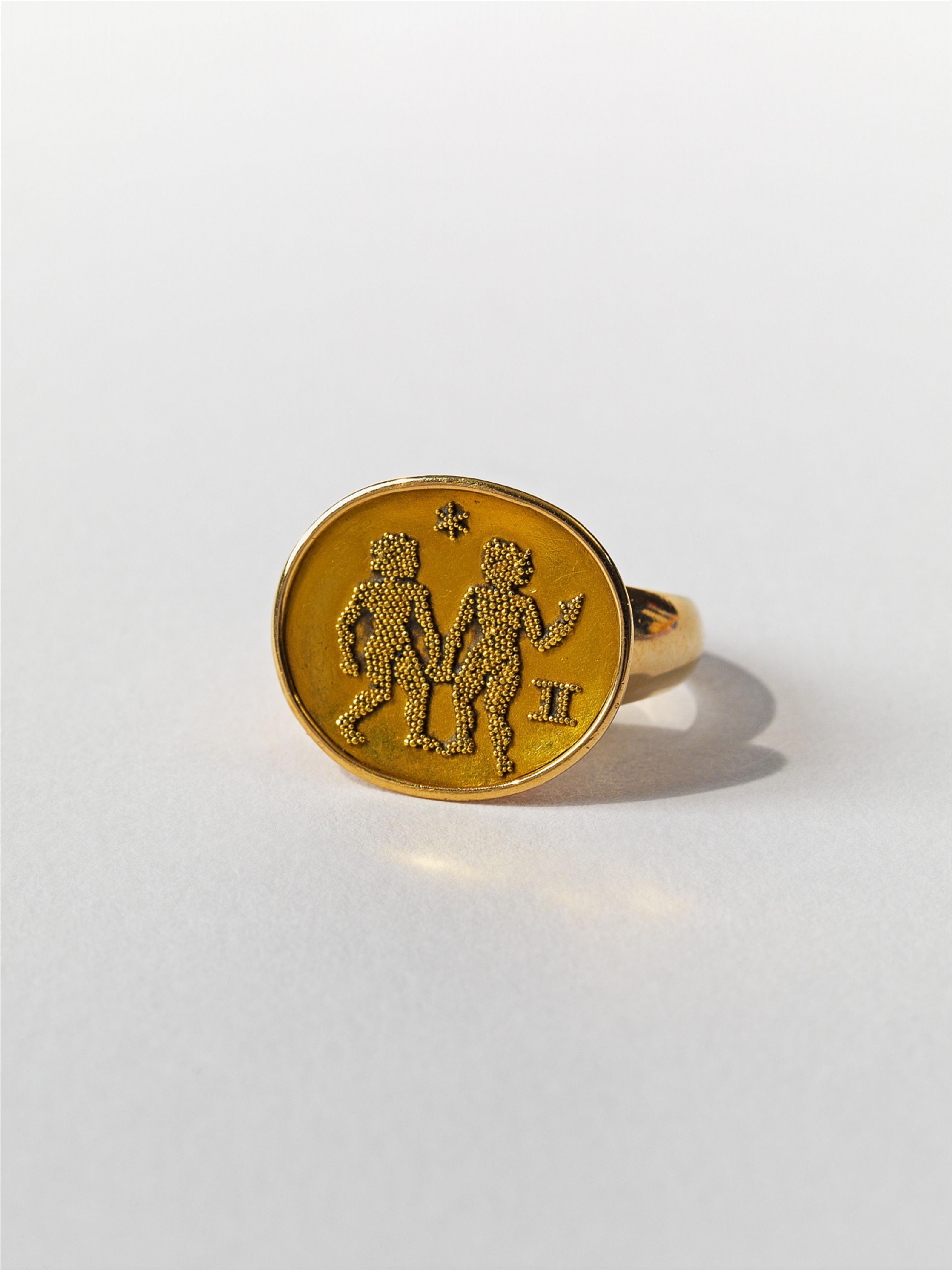 A 14k gold ring with granulated decor - image-1