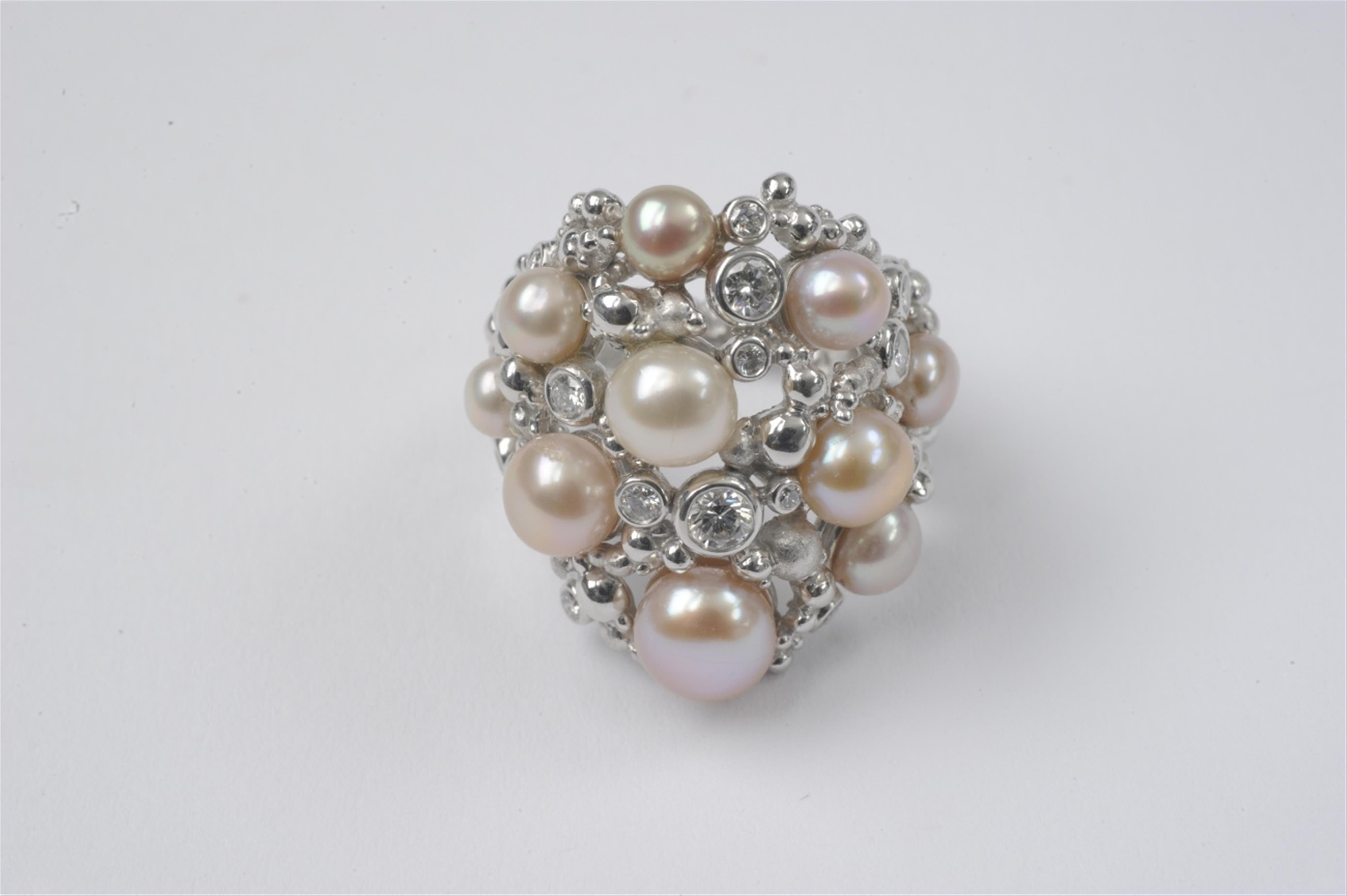 An 18k white gold, pearl, and diamond ring - image-1