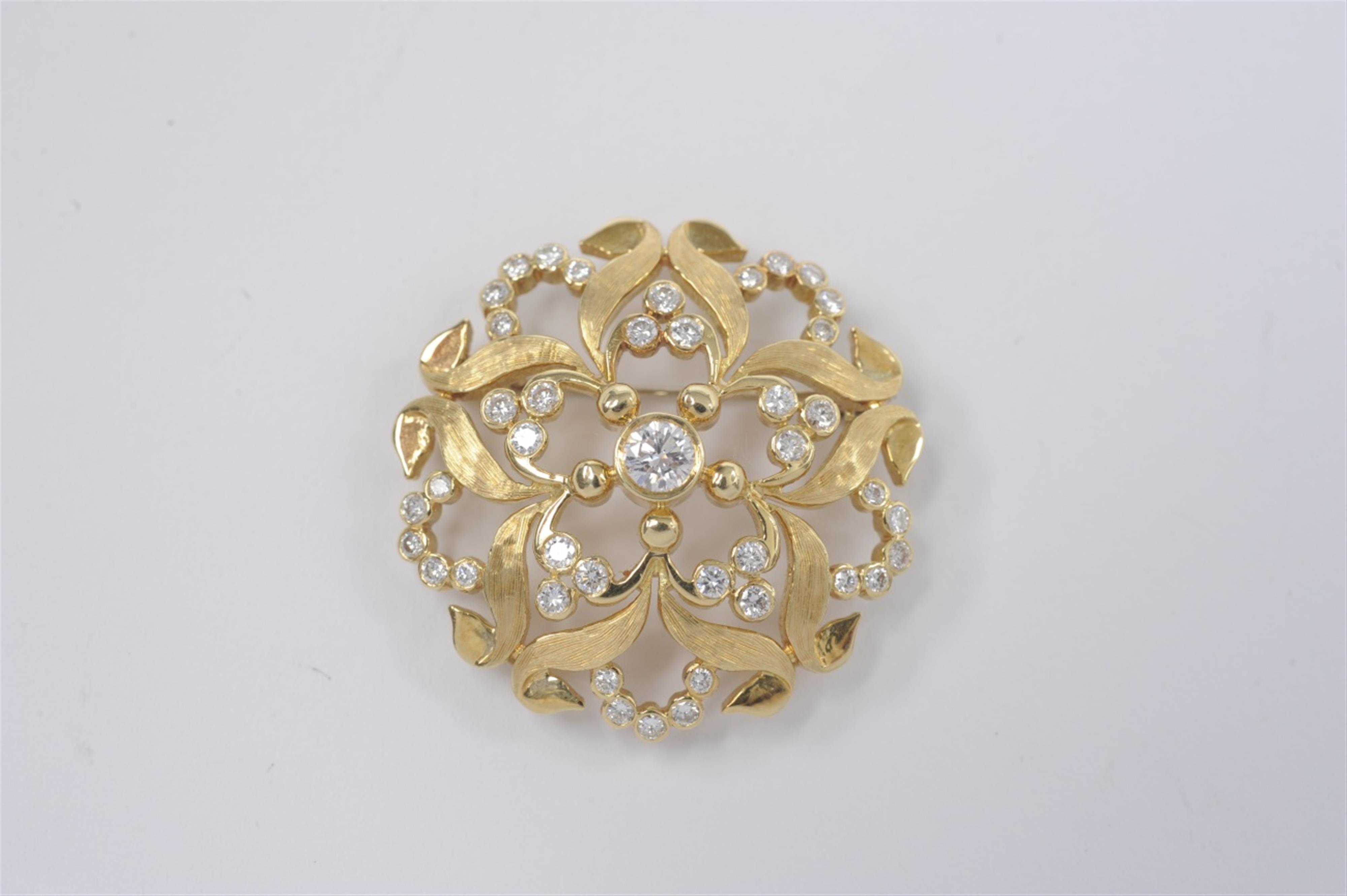 An 18k gold and diamond rosette brooch - image-1