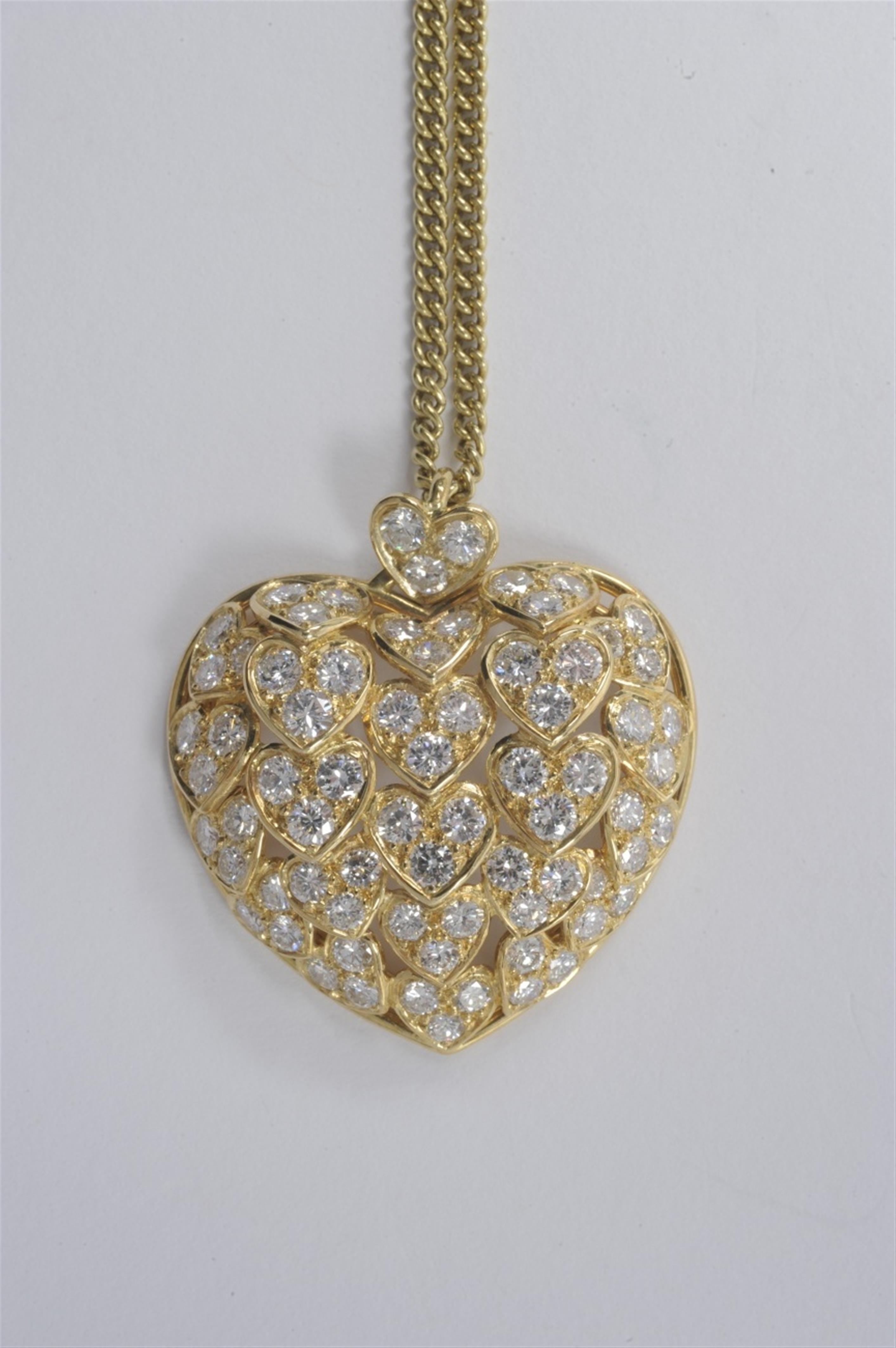 A heart-shaped 18k gold and diamond pendant - image-1