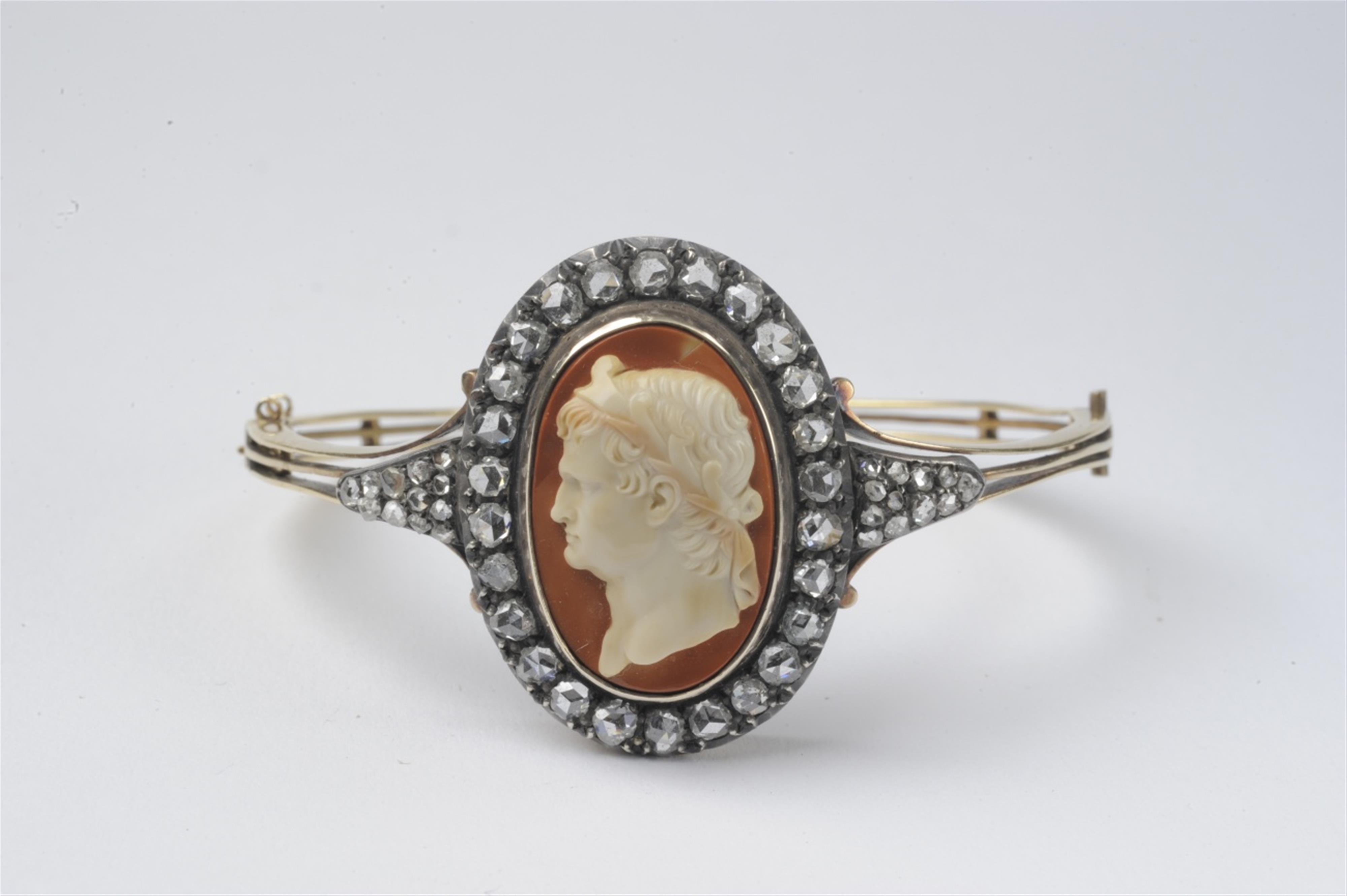 An 18k gold and silver bangle with an Imperial cameo - image-1