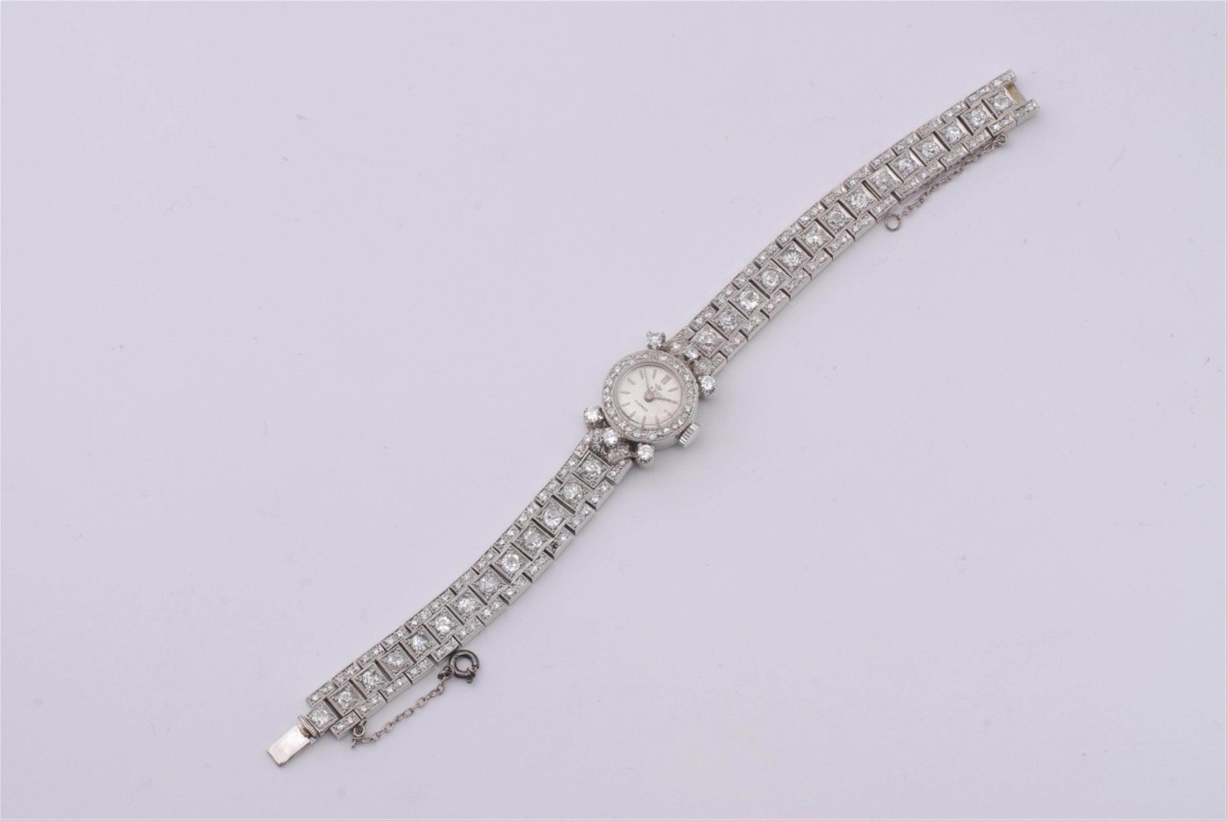 A Swiss platinum Art Deco cocktail watch - image-1