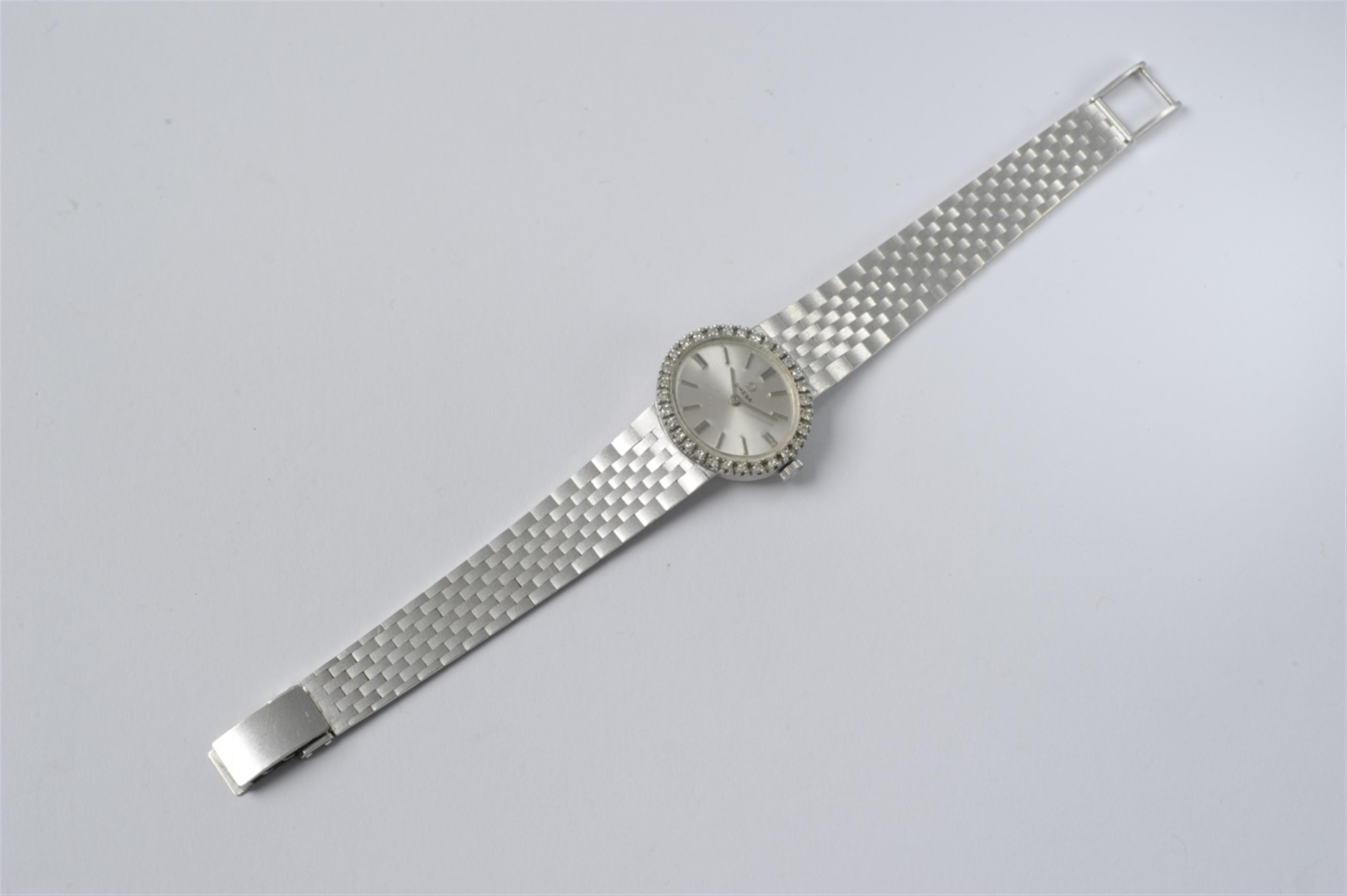 An Omega 18k white gold and diamond ladie's cocktail wristwatch - image-2