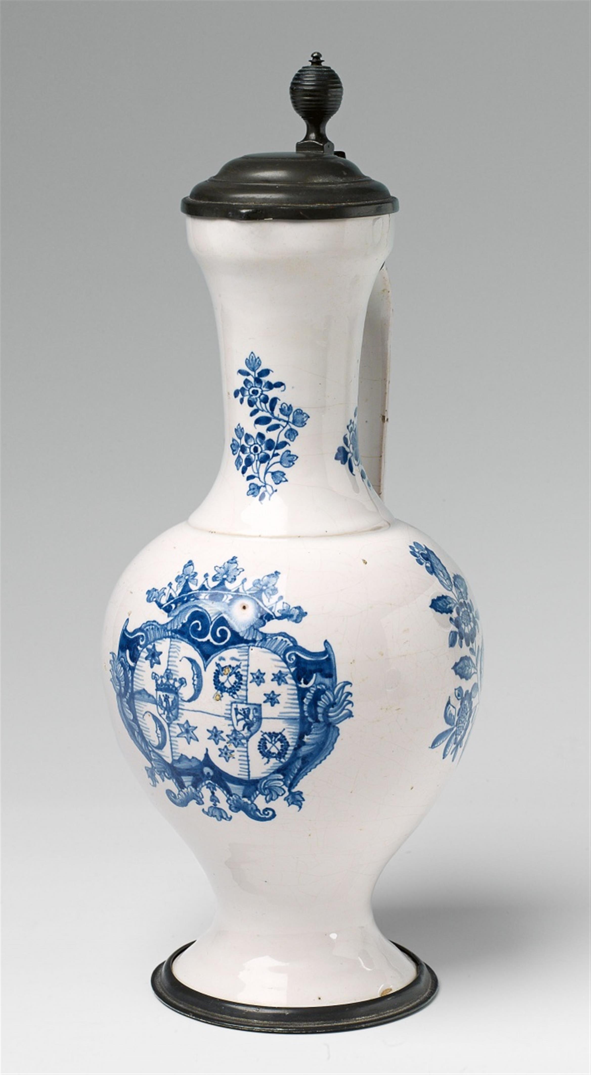 A Nuremberg faience jug with blue and white armorial decor - image-1