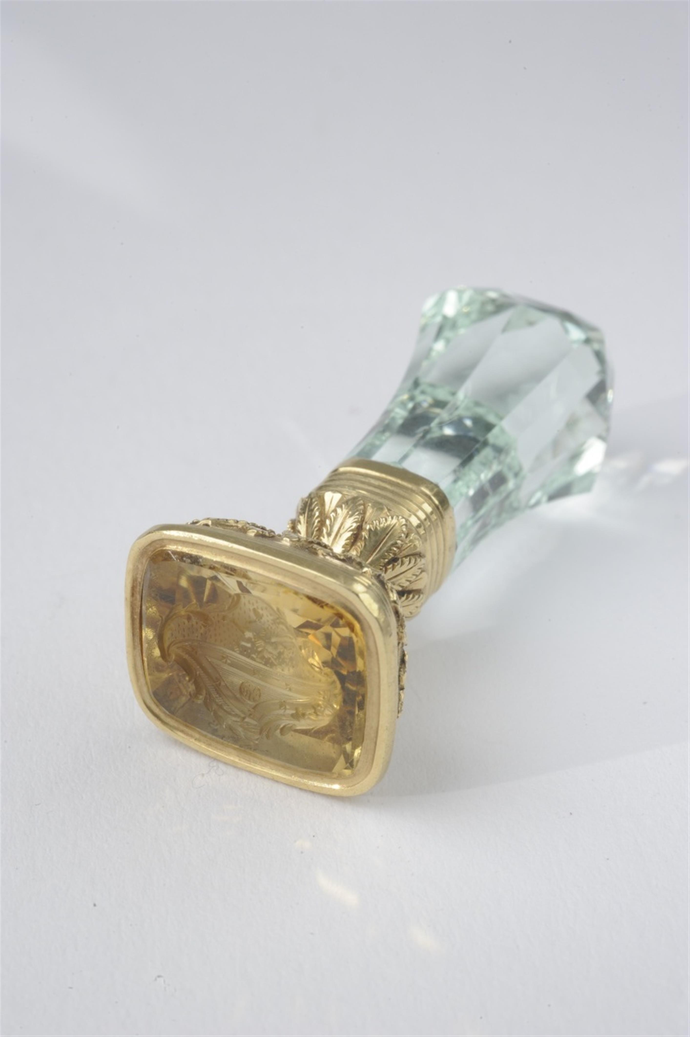 A 14k gold seal with a citrine intaglio - image-1