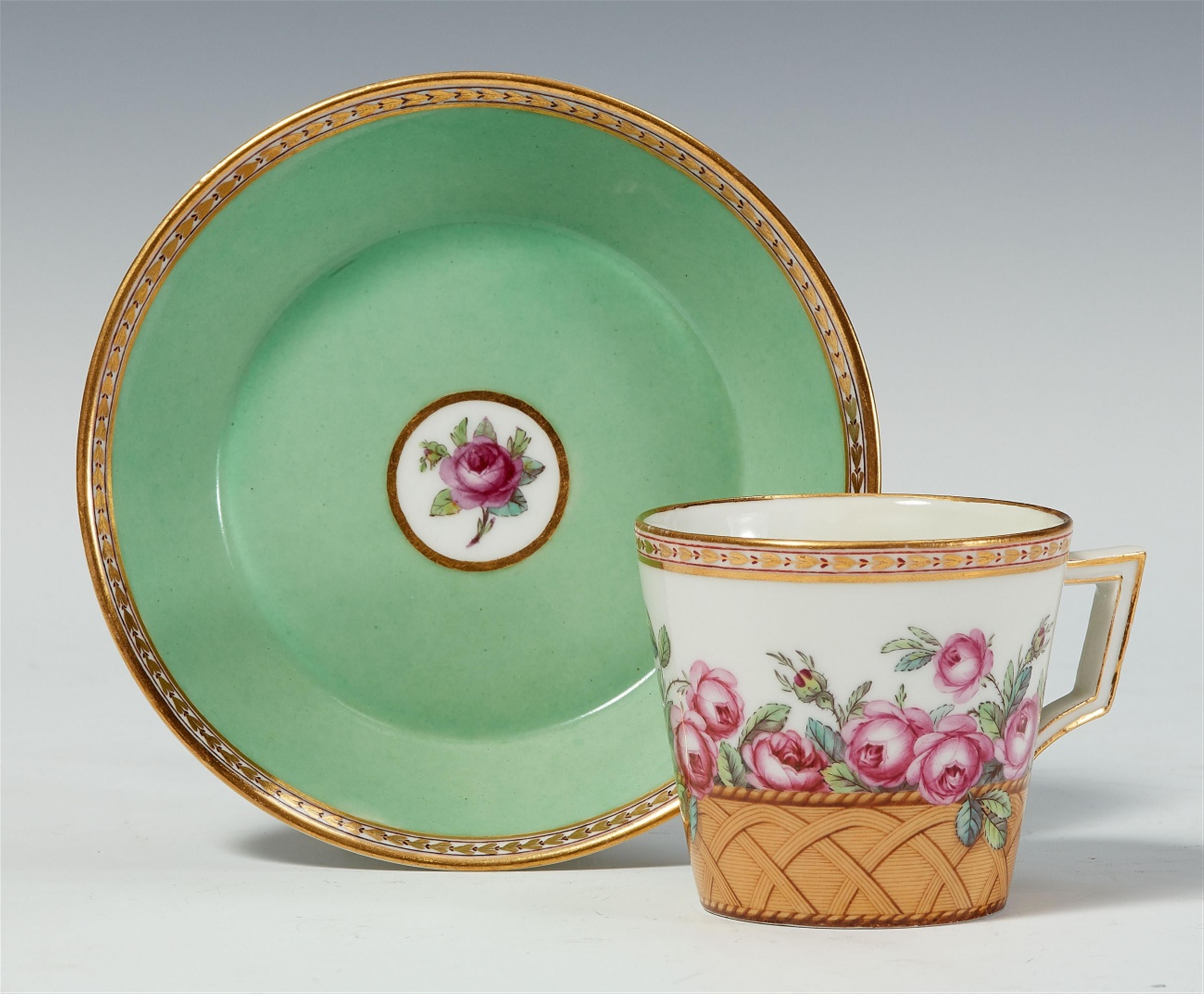 A Berlin KPM porcelain cup and saucer designed as a basket of roses - image-1