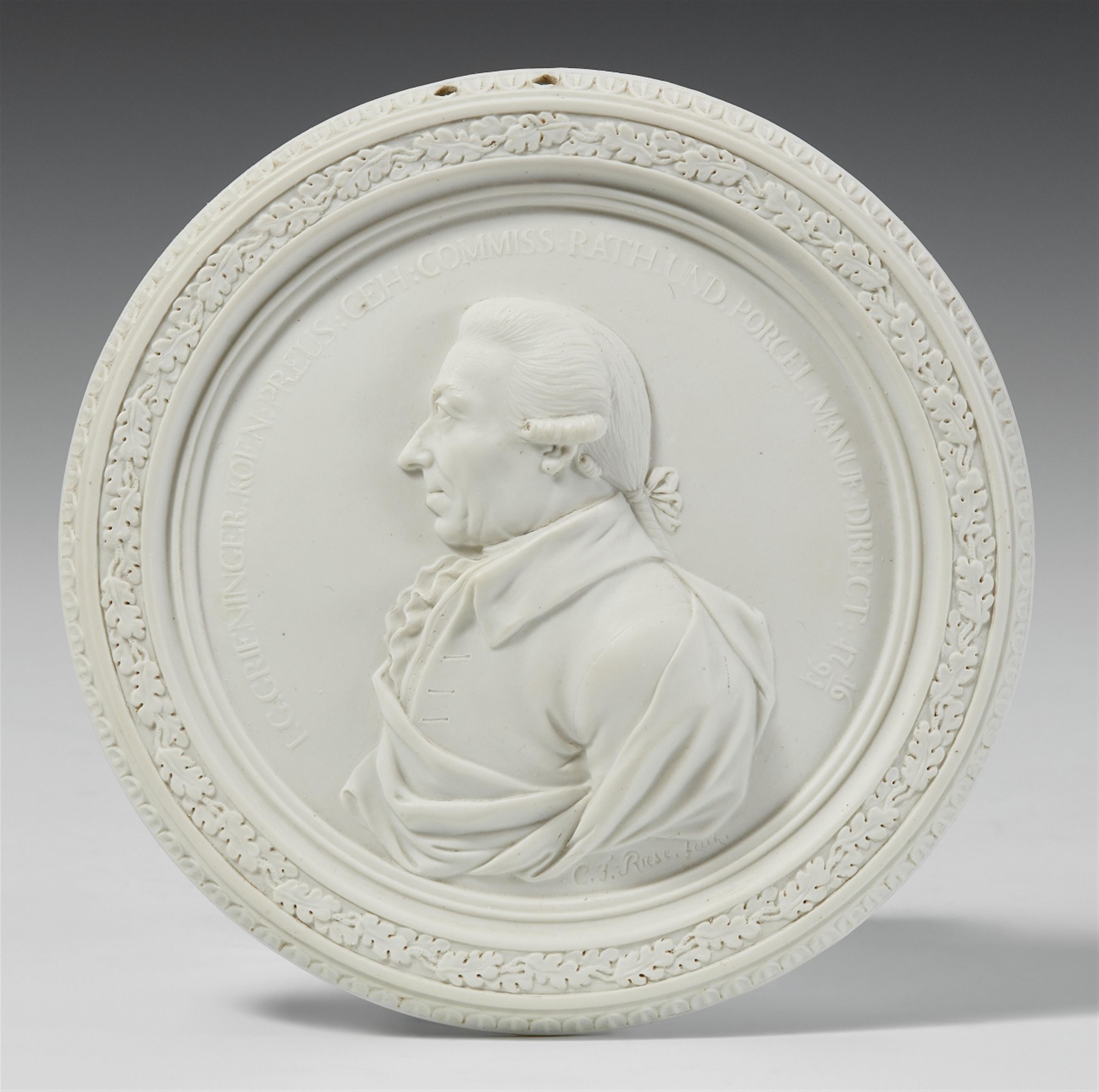 A Berlin KPM biscuit porcelain medallion with a portrait of Johann Georg Grieninger - image-1
