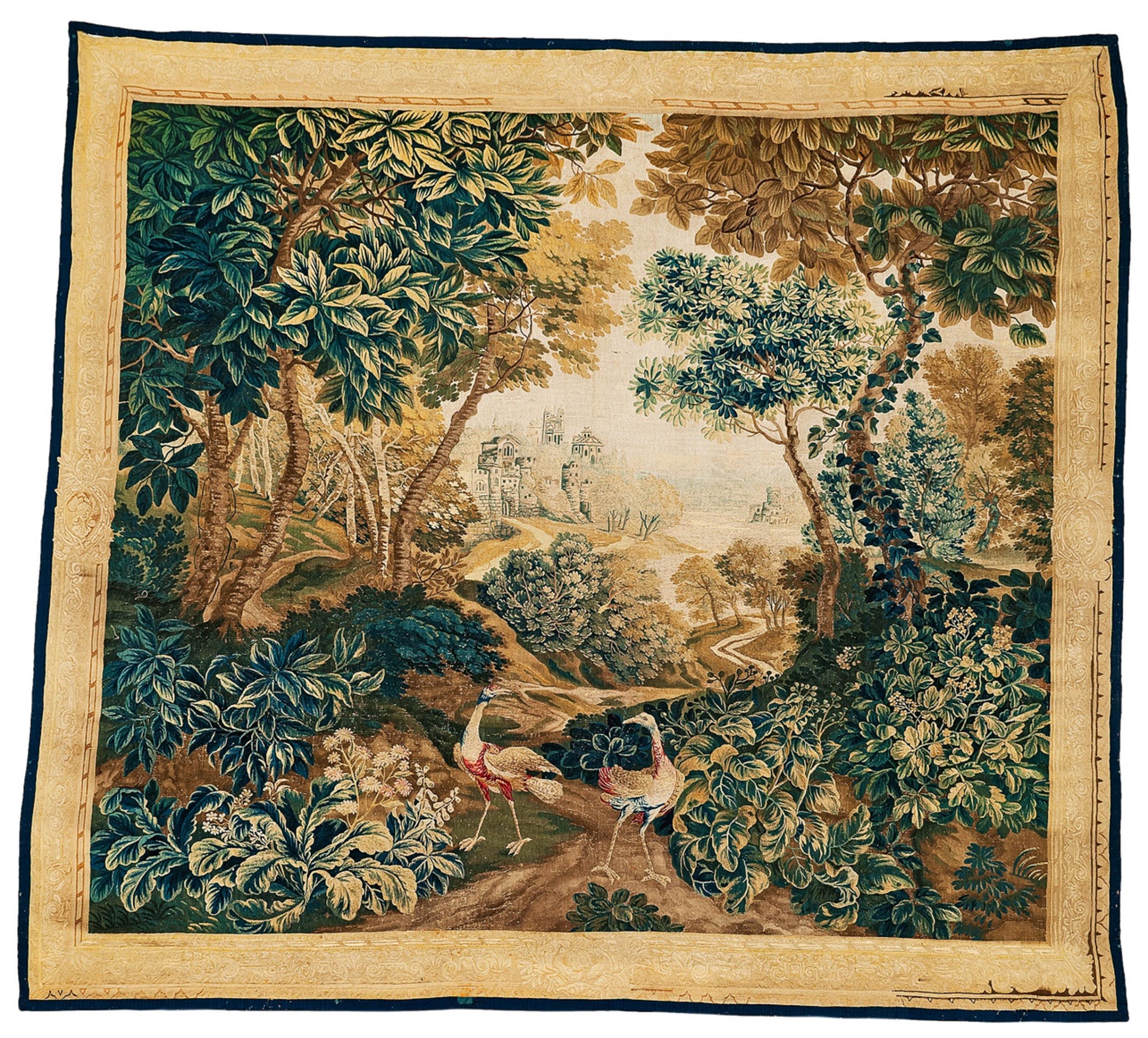 A Flemish wool and silk tapestry with two cranes in a garden - image-1