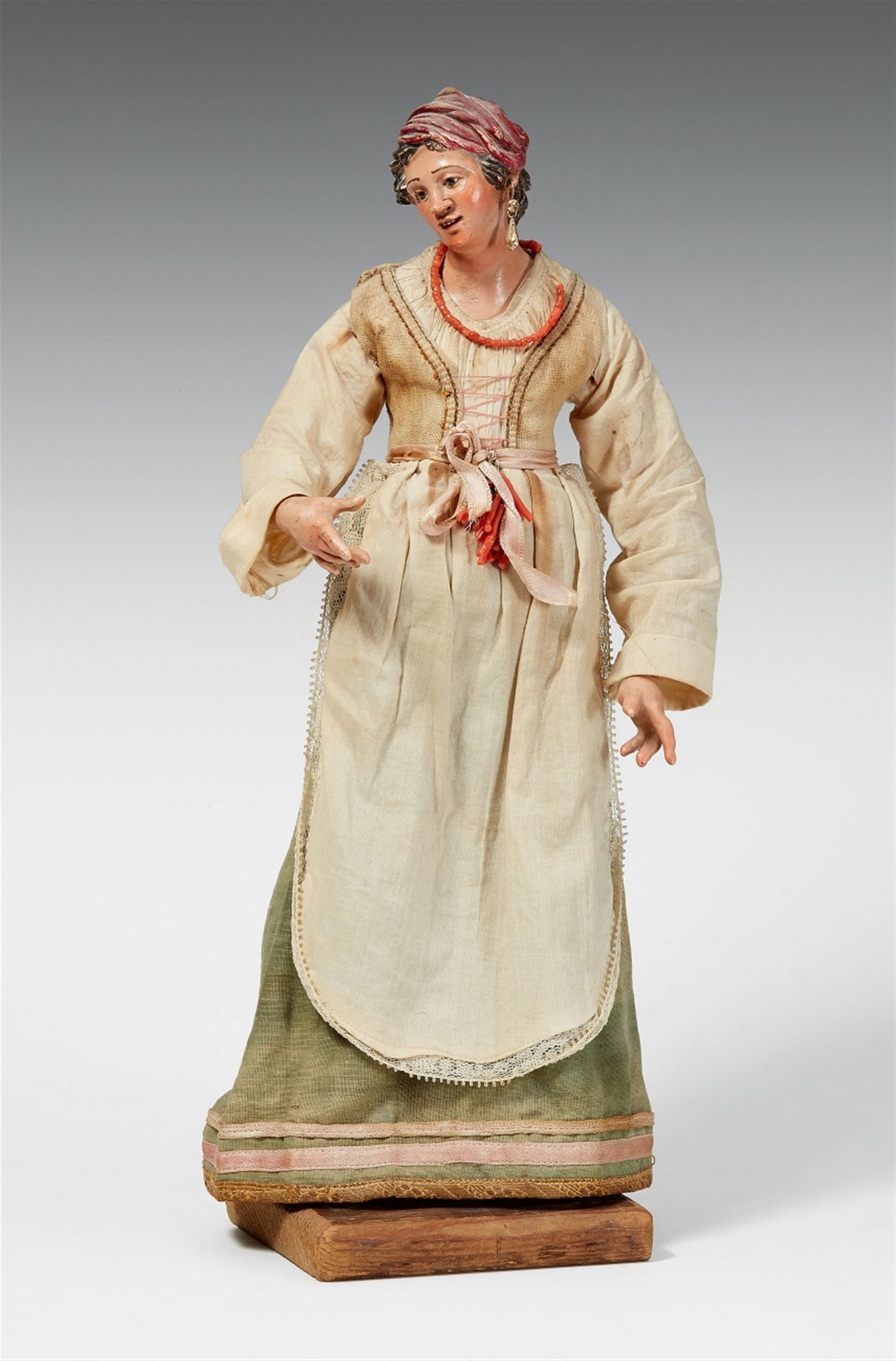 An Italian nativity figure of a young peasant girl - image-1