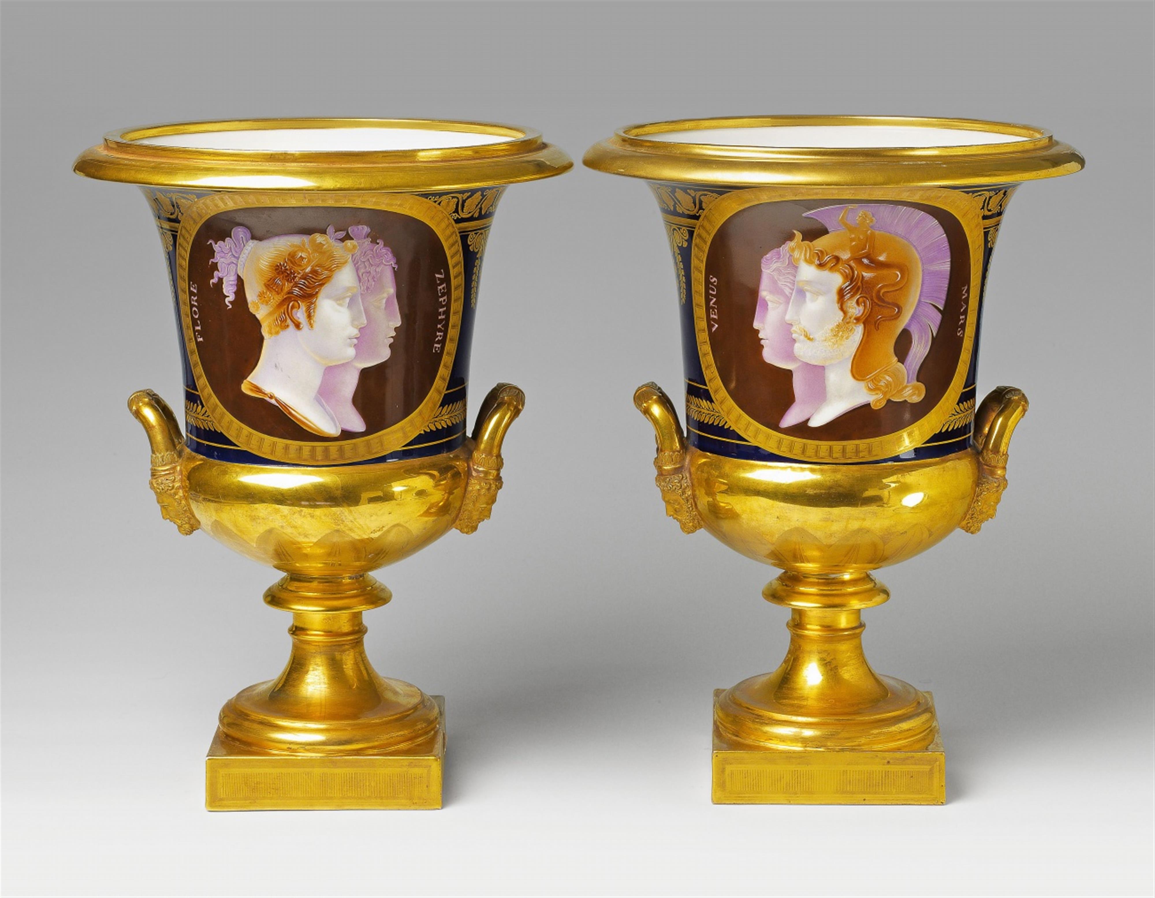 A pair of porcelain "Medici" vases with faux cameo decor - image-1