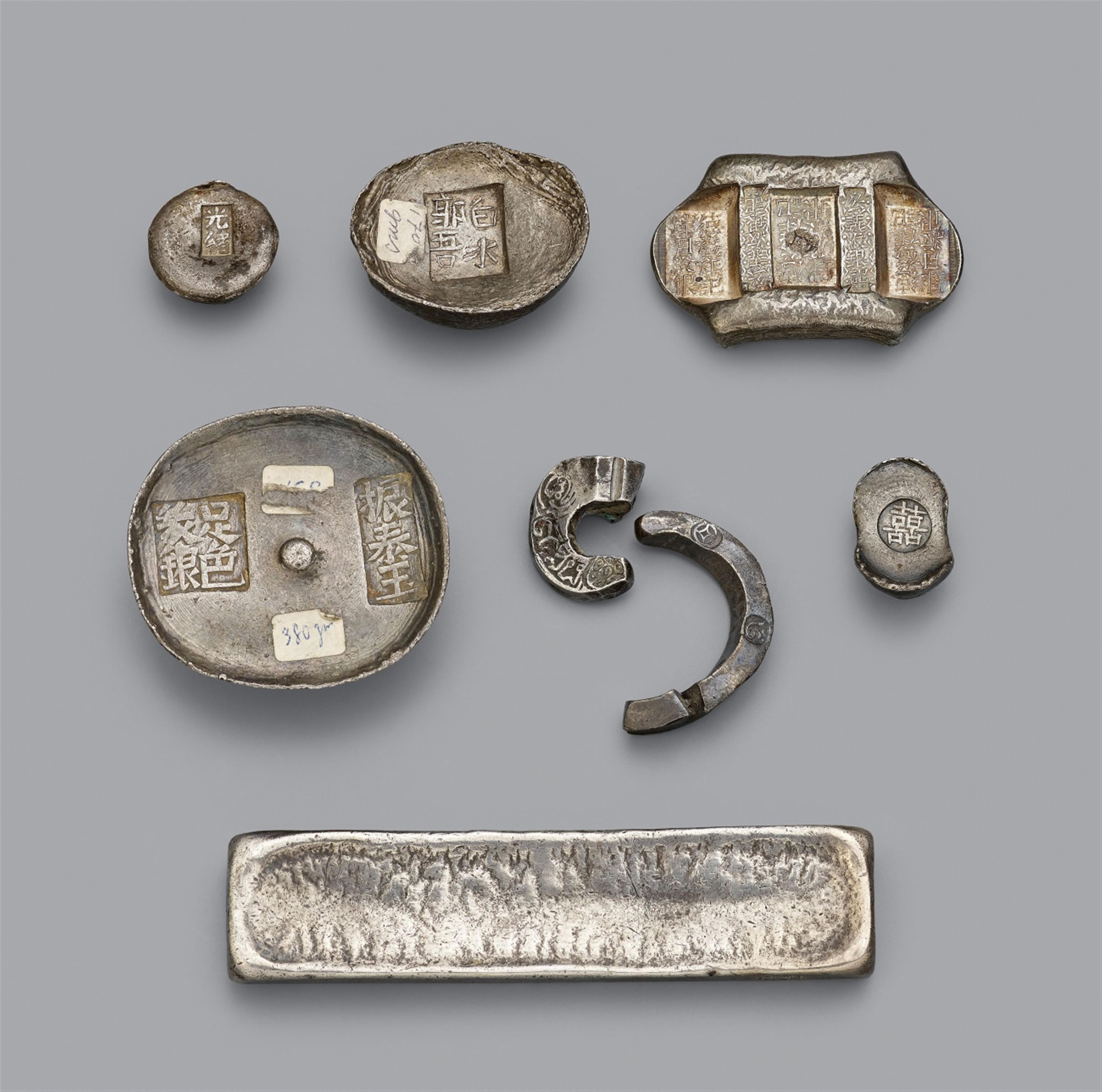 Six Chinese and two Southeast Asian silver ingots. 19th/20th century - image-1