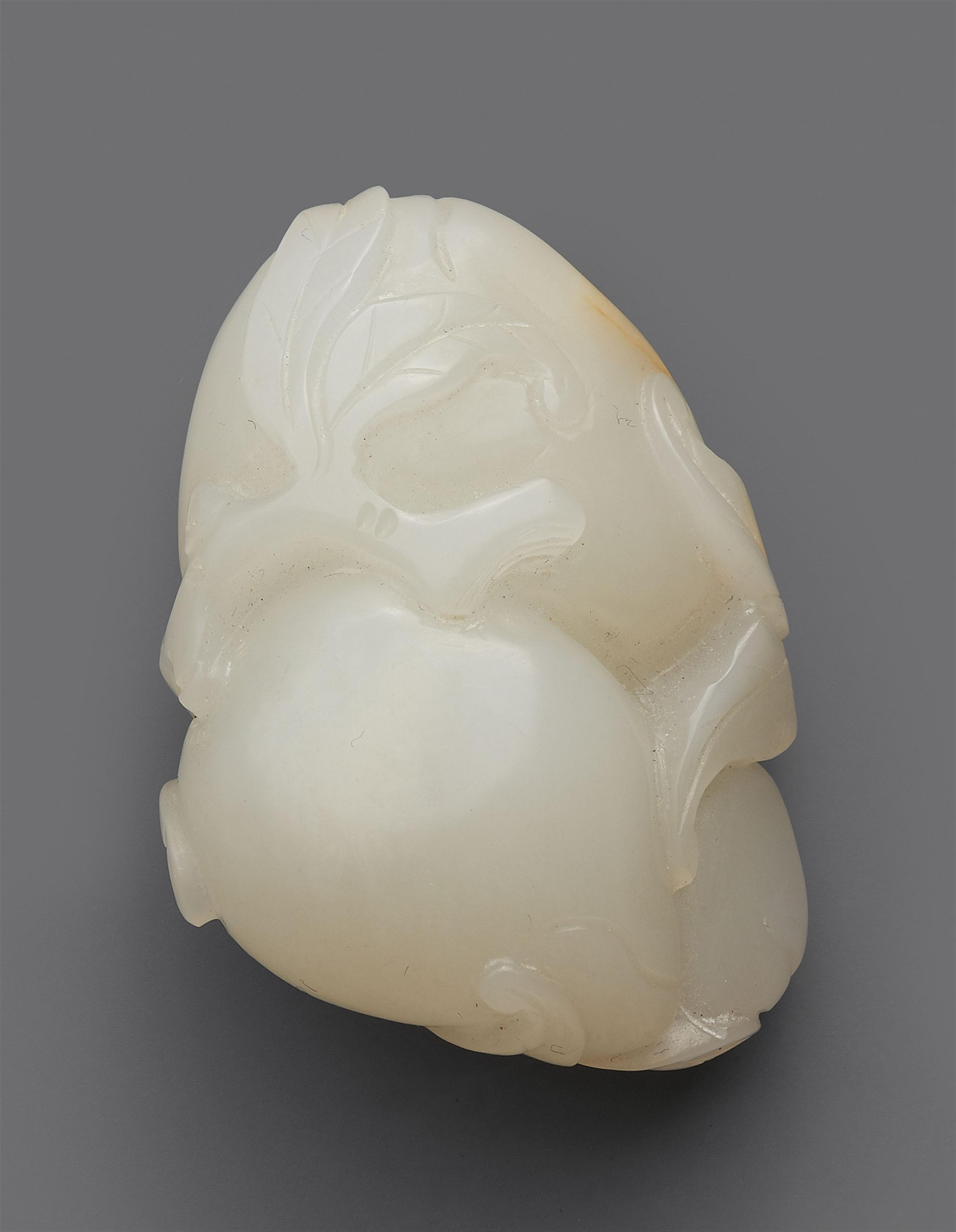 A white jade pendant - image-1