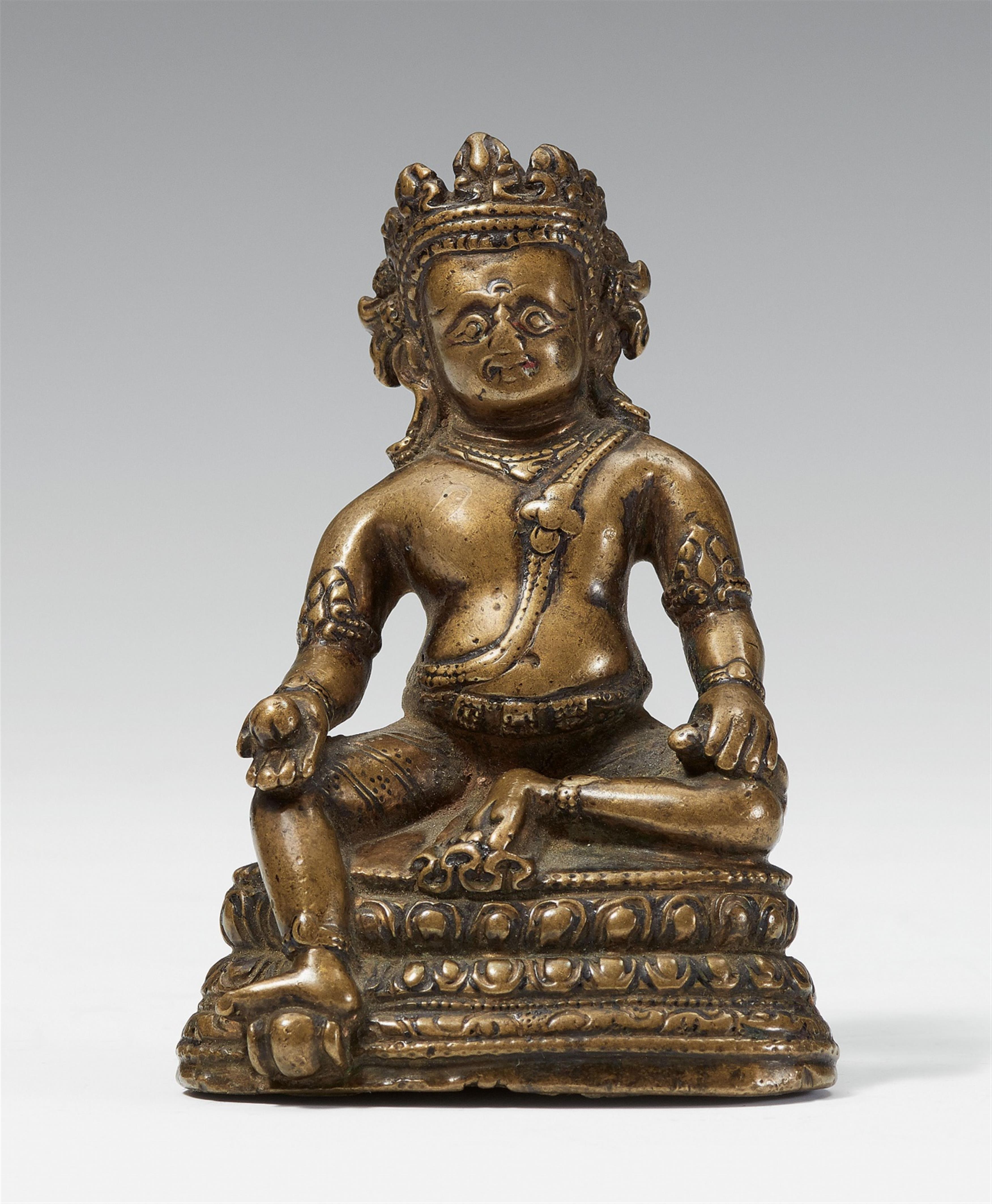 A Tibetan bronze figure of Jambhala. Pala style, 13th century - image-1