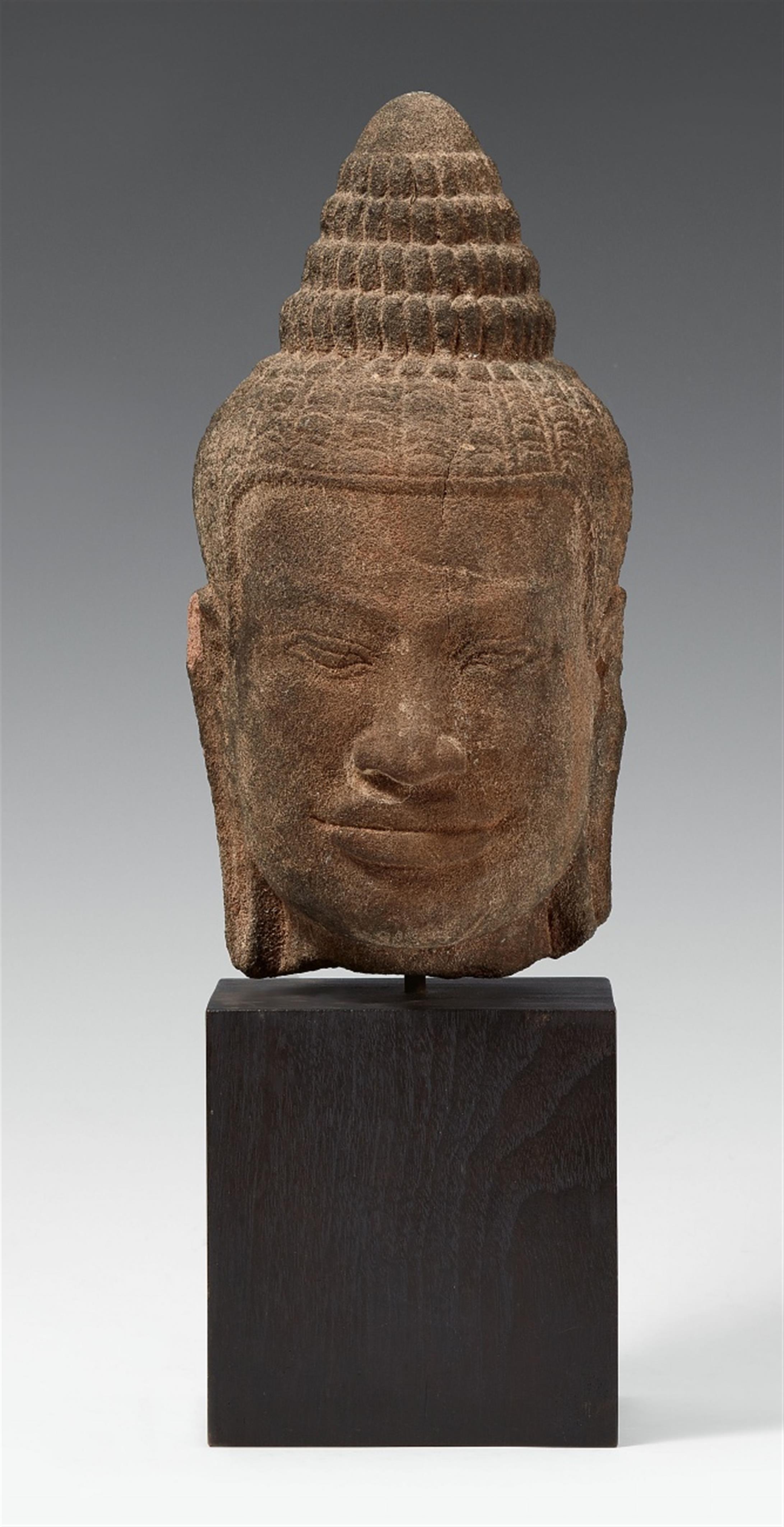 A Bayon-style sandstone head of a Buddha. 12th/13th century - image-1