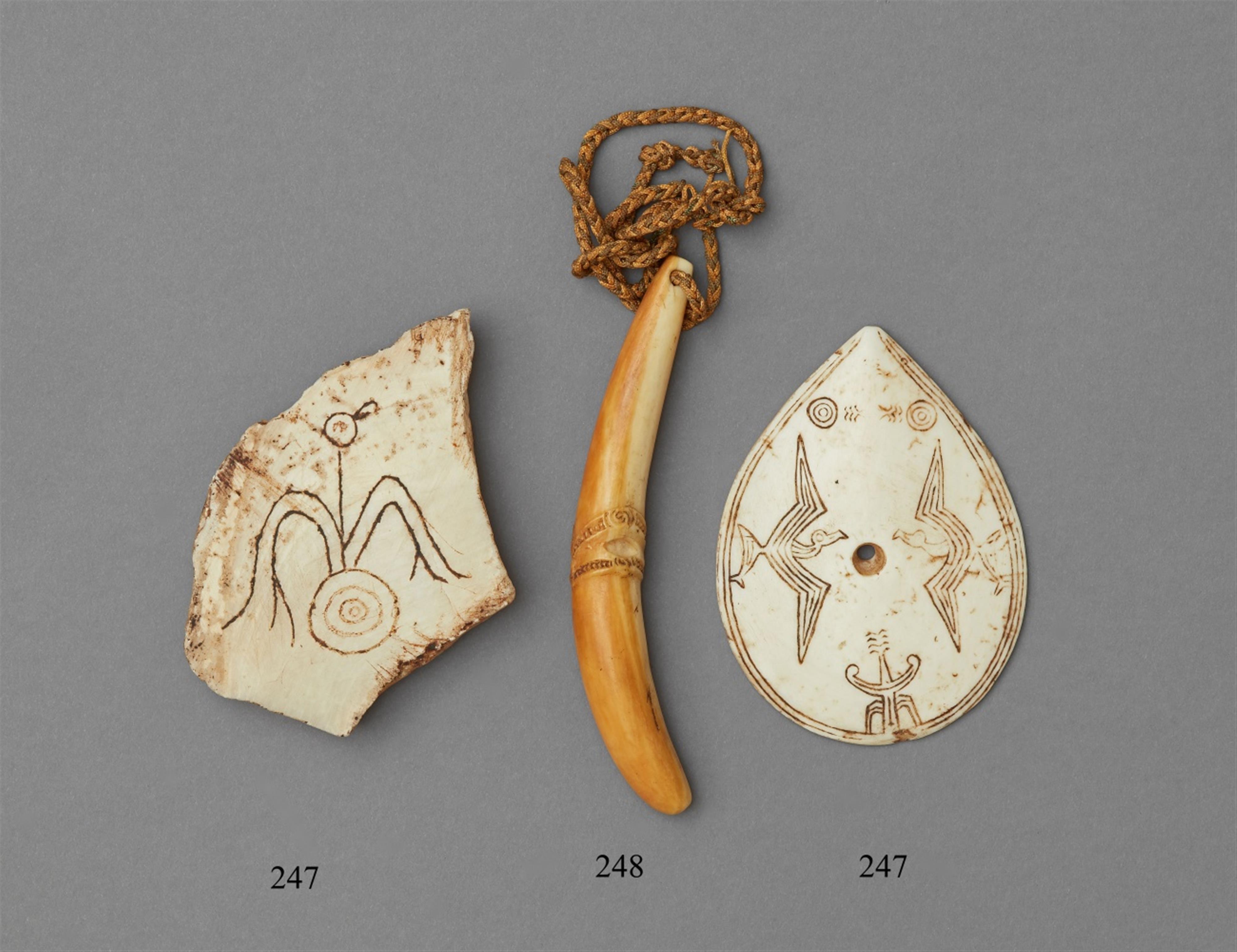 TWO ENGRAVED CLAM SHELL ARTEFACTS - image-1