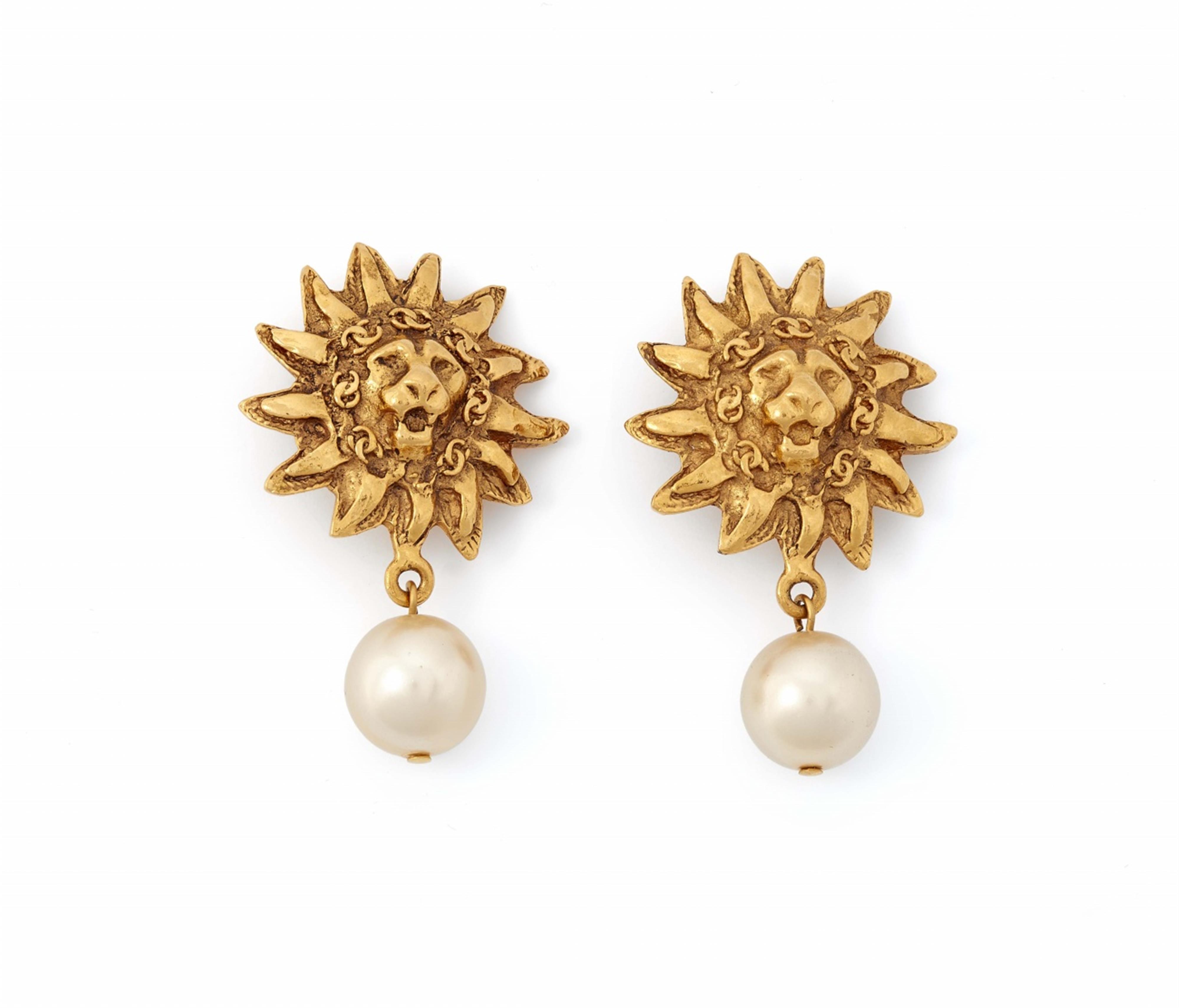 A pair of Chanel lion clip earrings,1982 - image-1