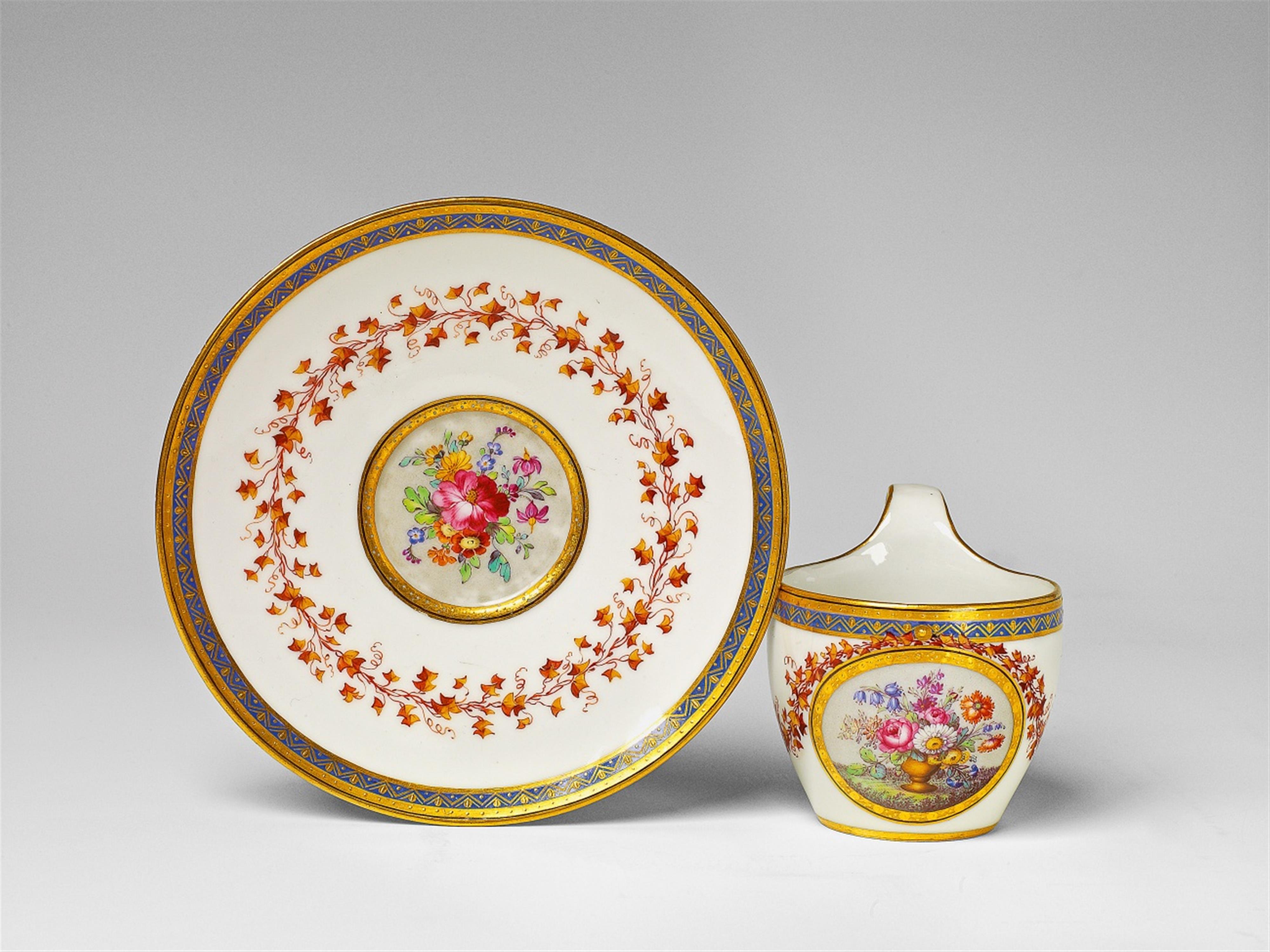 A Berlin KPM porcelain cup and saucer with floral decor - image-1