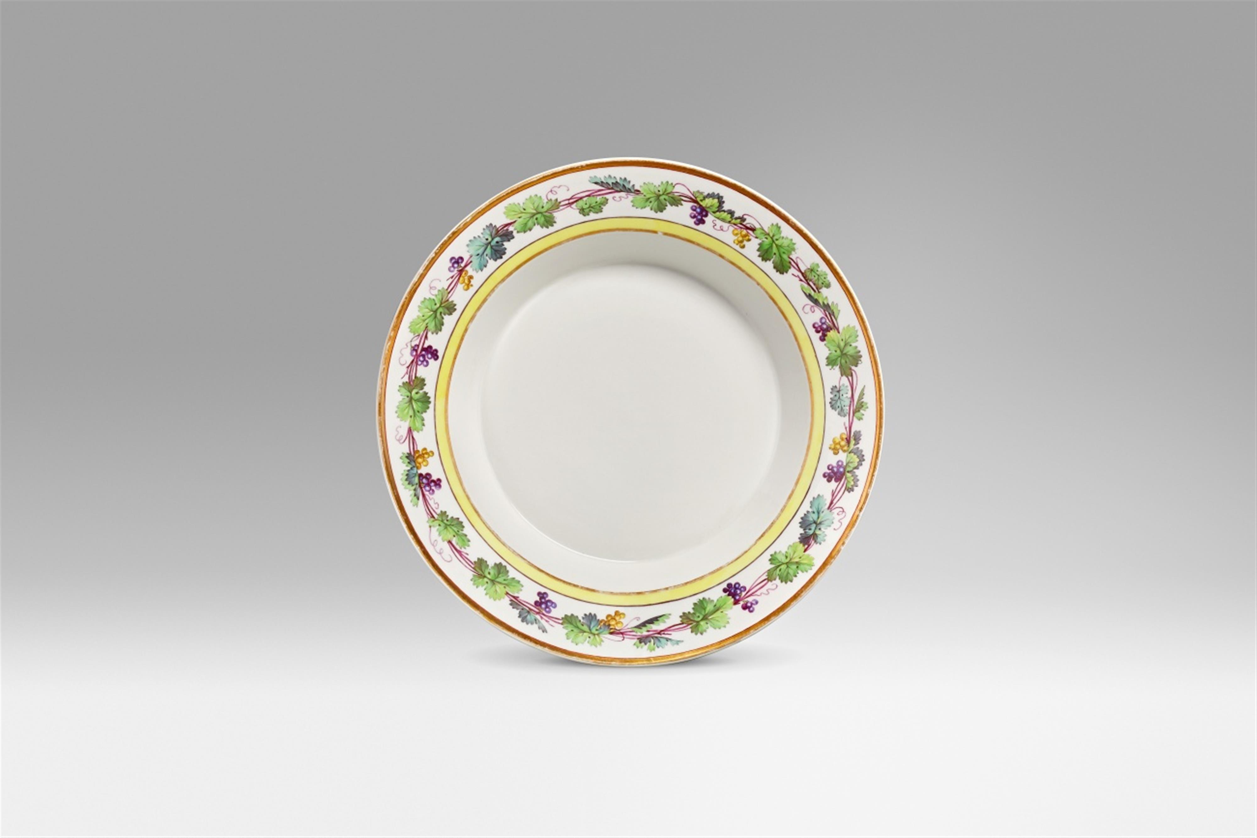 A Berlin KPM porcelain plate from the dinner service with coloured vines - image-1