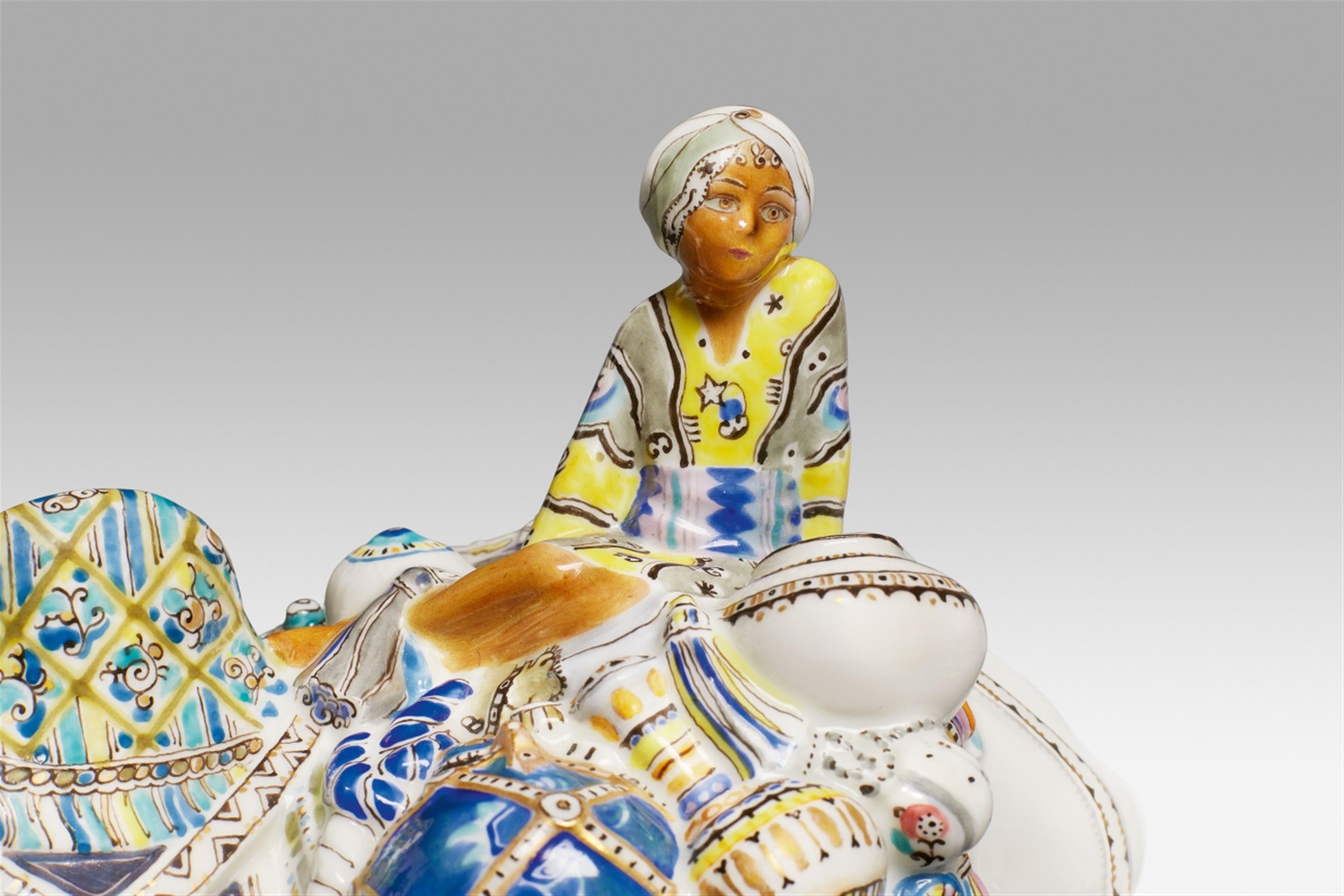 A Berlin KPM porcelain figure of a gnu rider from the "Indian Procession" series - image-2