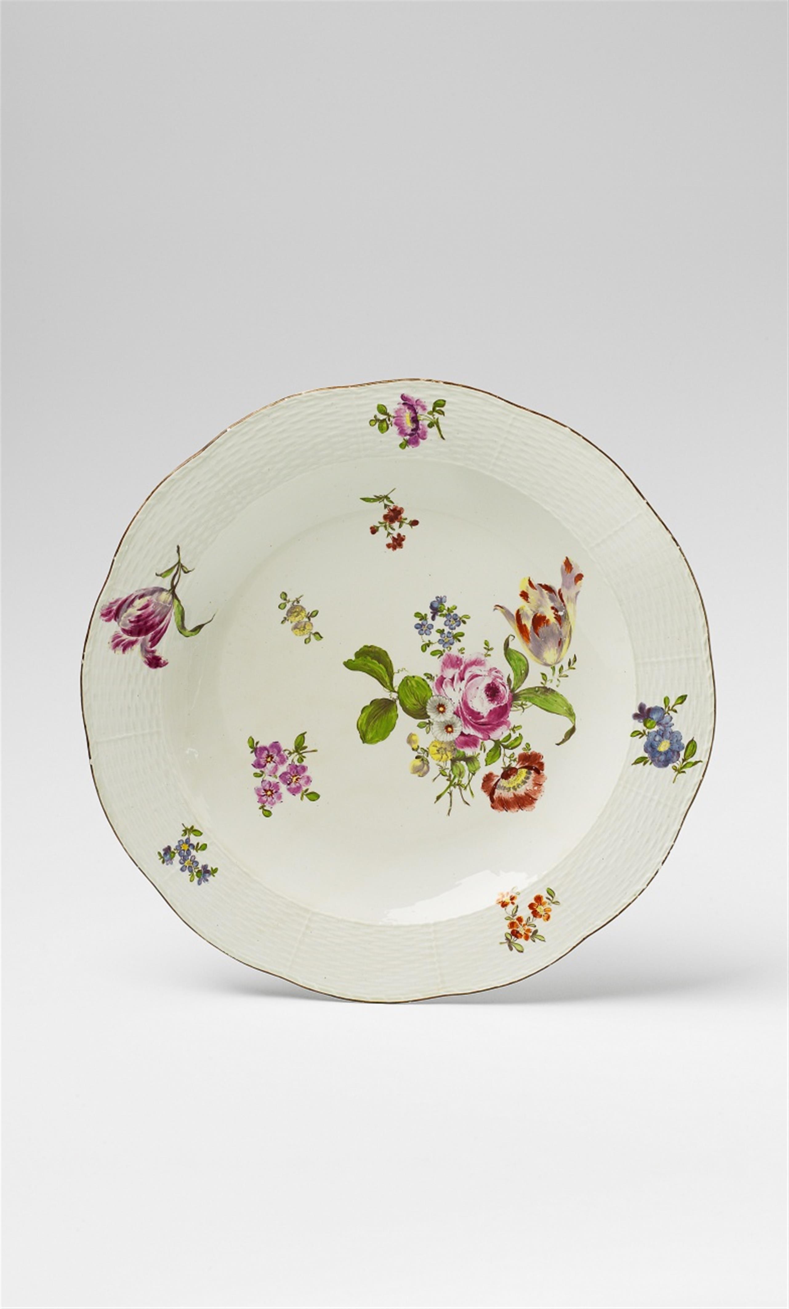An early Berlin KPM porcelain platter with floral decor - image-1