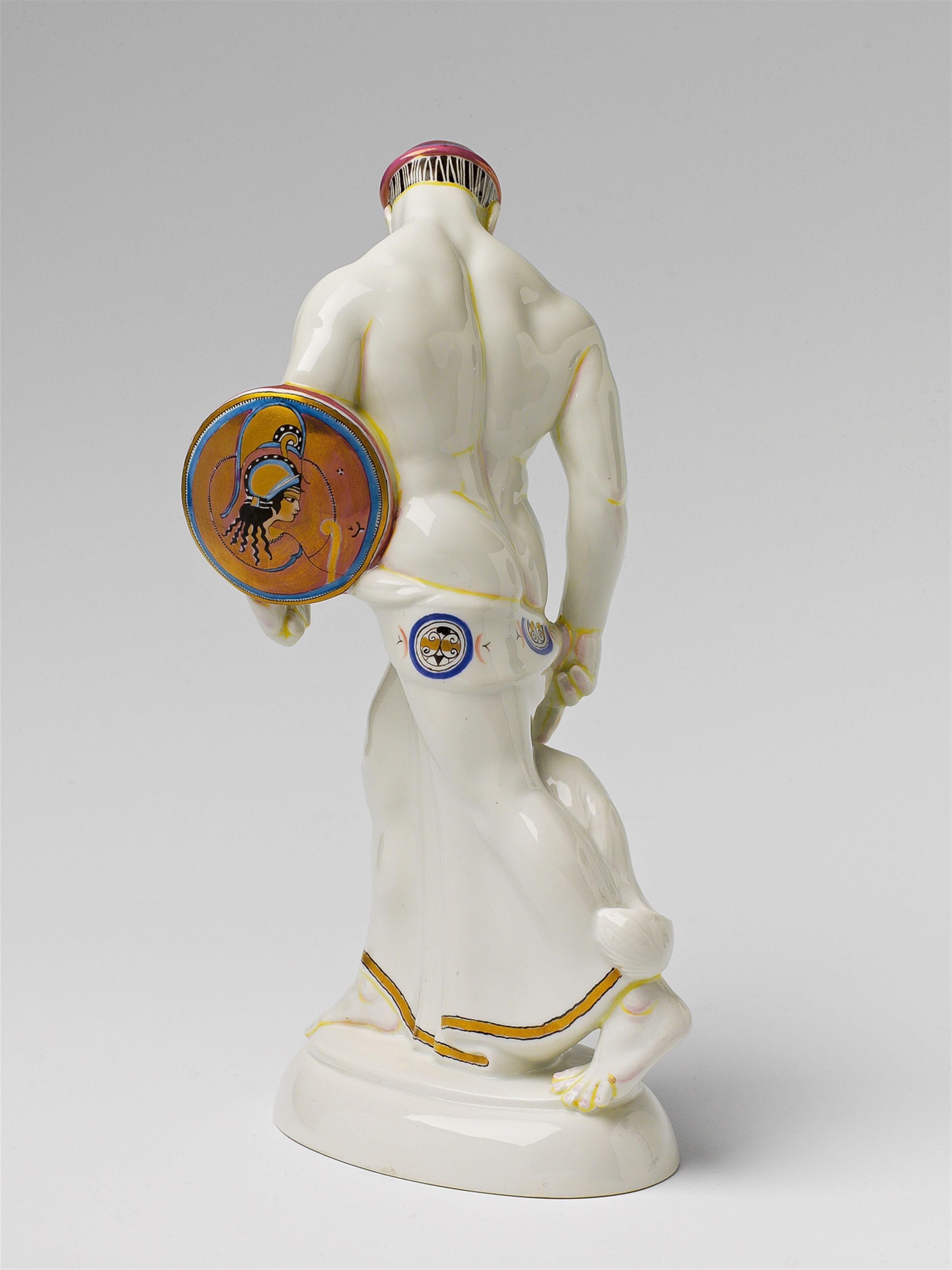 A Berlin KPM porcelain figure of a Gothic man with a dog - image-2