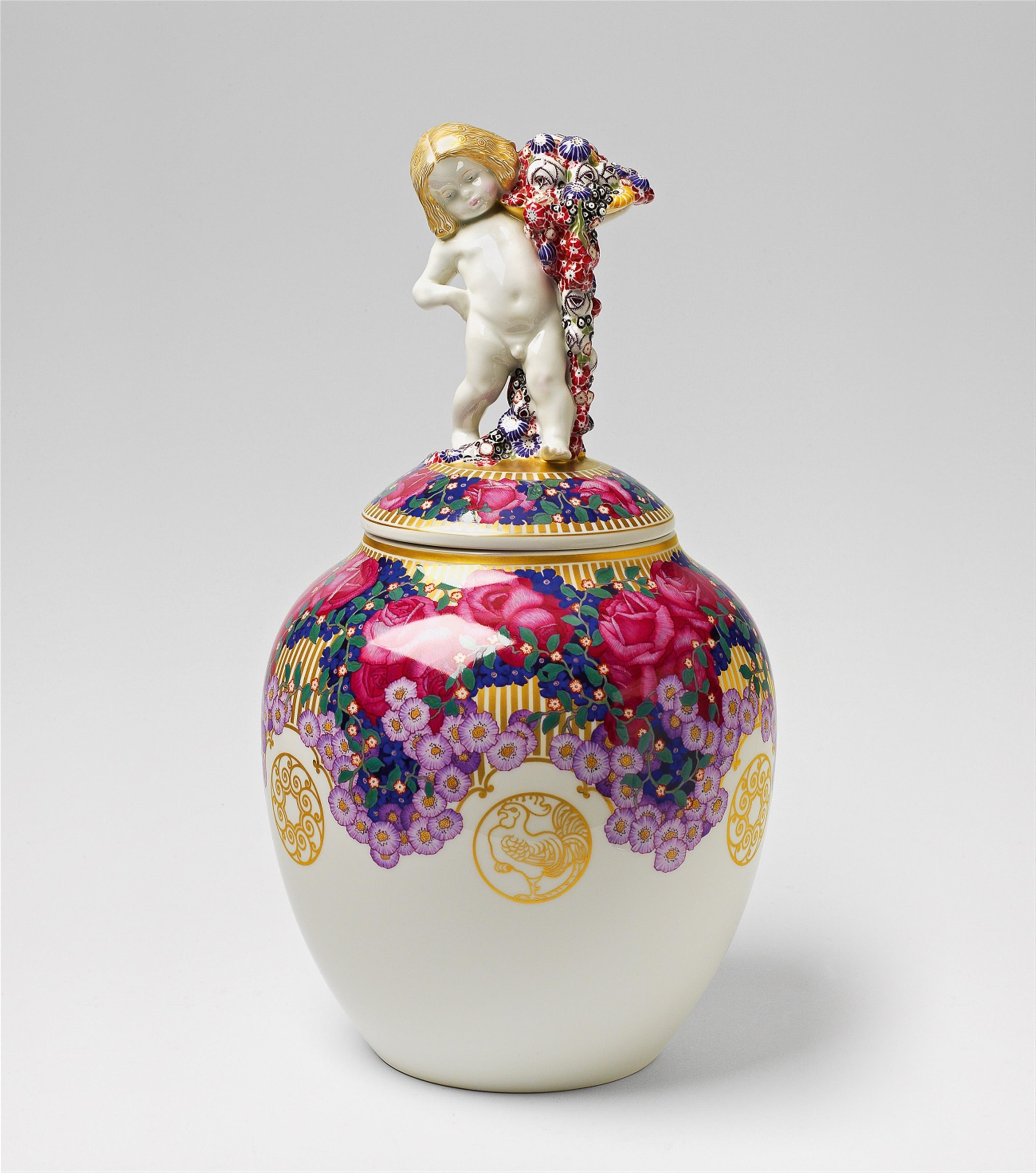 A Berlin KPM porcelain vase and cover with a putto finial - image-1