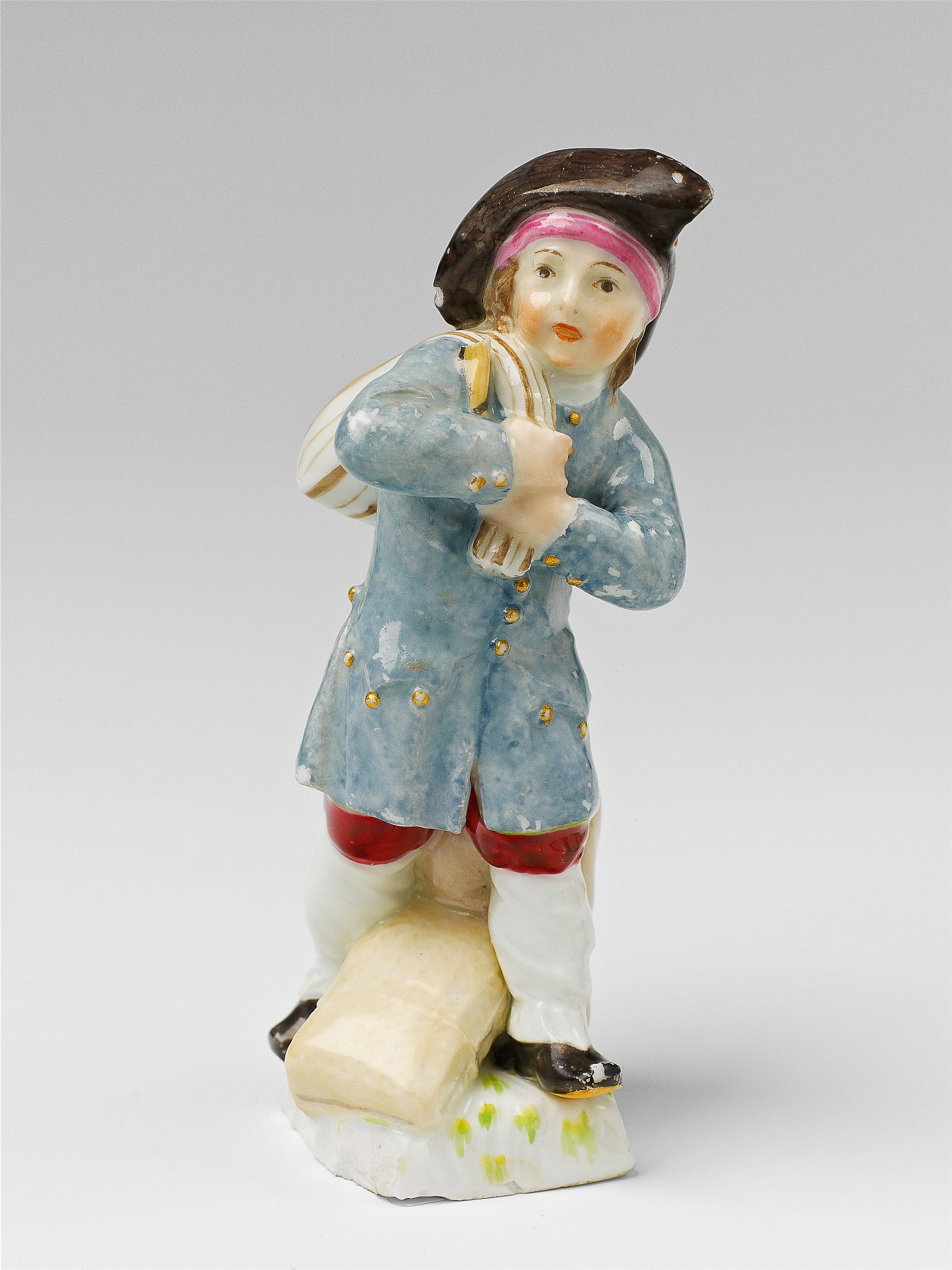 A Berlin KPM porcelain figure of a little farm boy - image-1