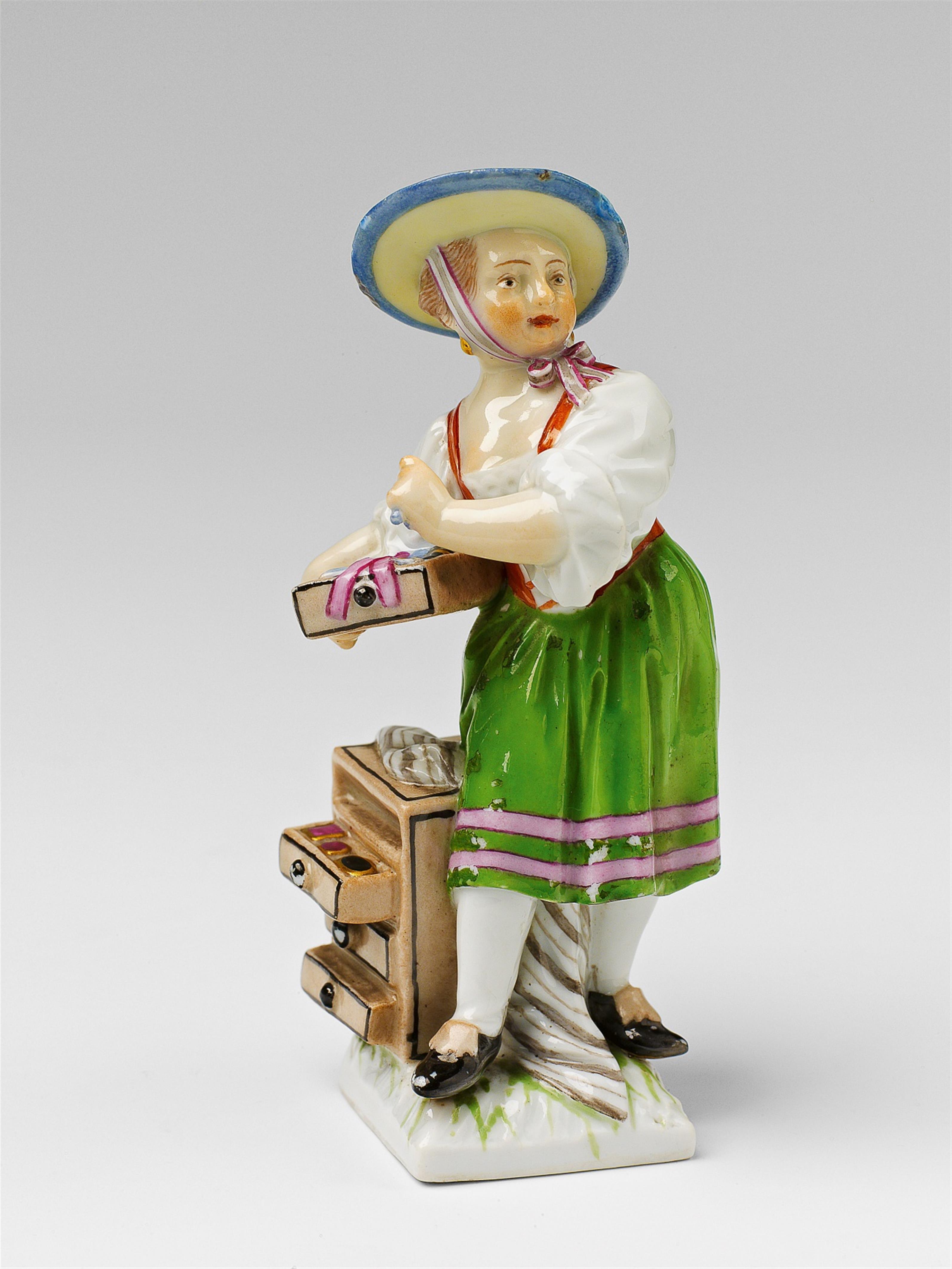A Berlin KPM porcelain figure of a Tyrolese girl - image-1