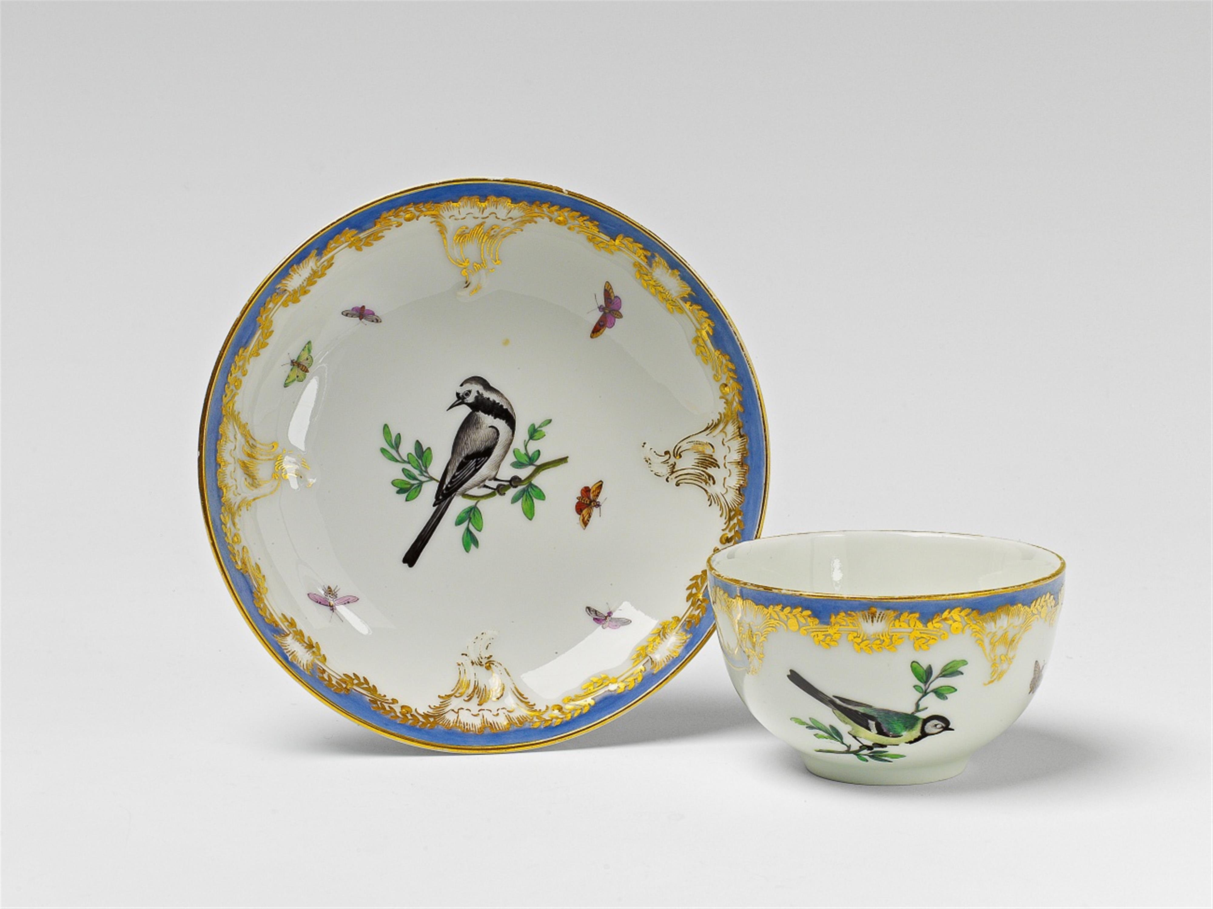 A Berlin KPM porcelain cup and saucer with bird and insect decor - image-2