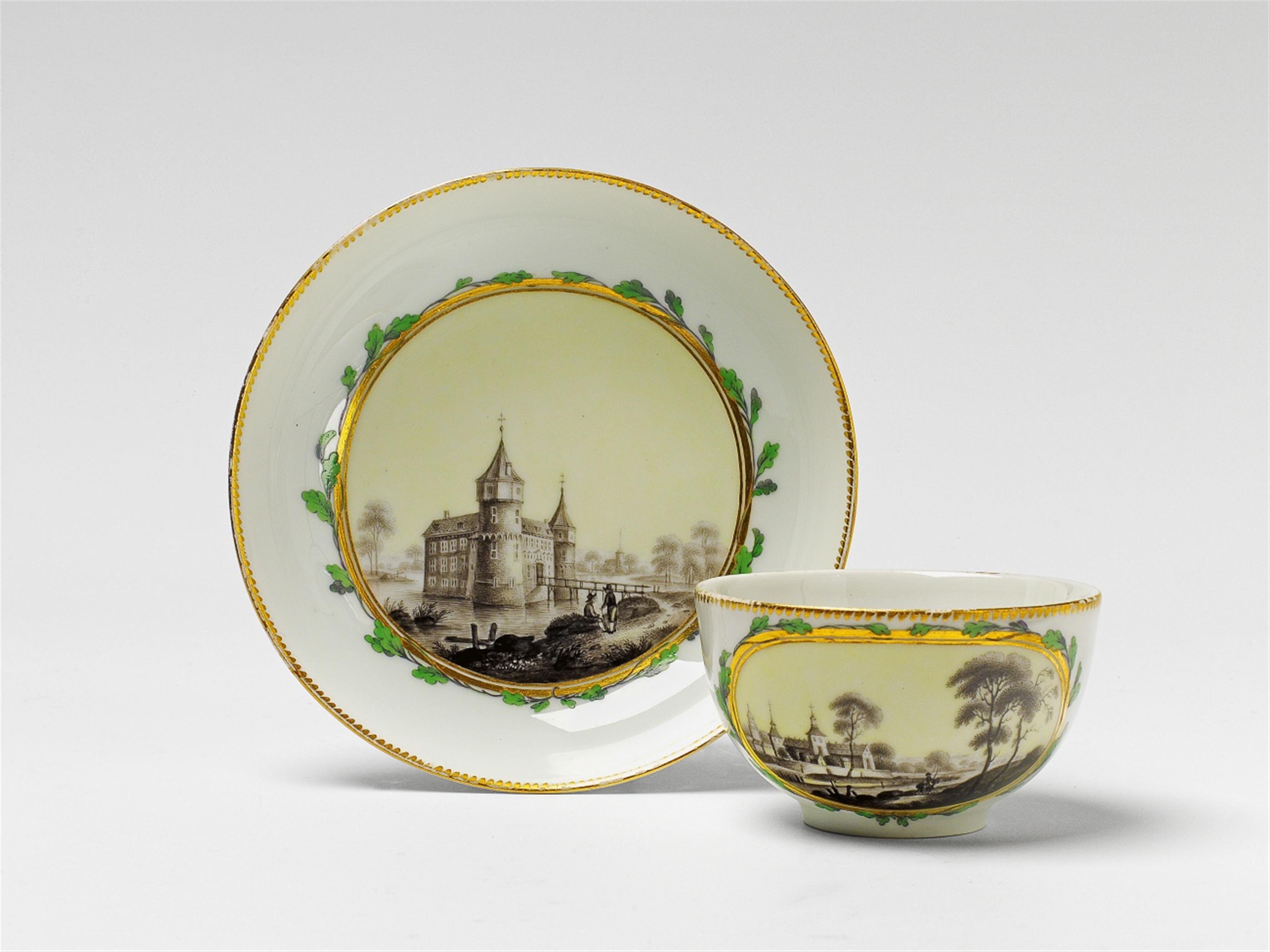 A Berlin KPM porcelain teacup finely painted with castles - image-2