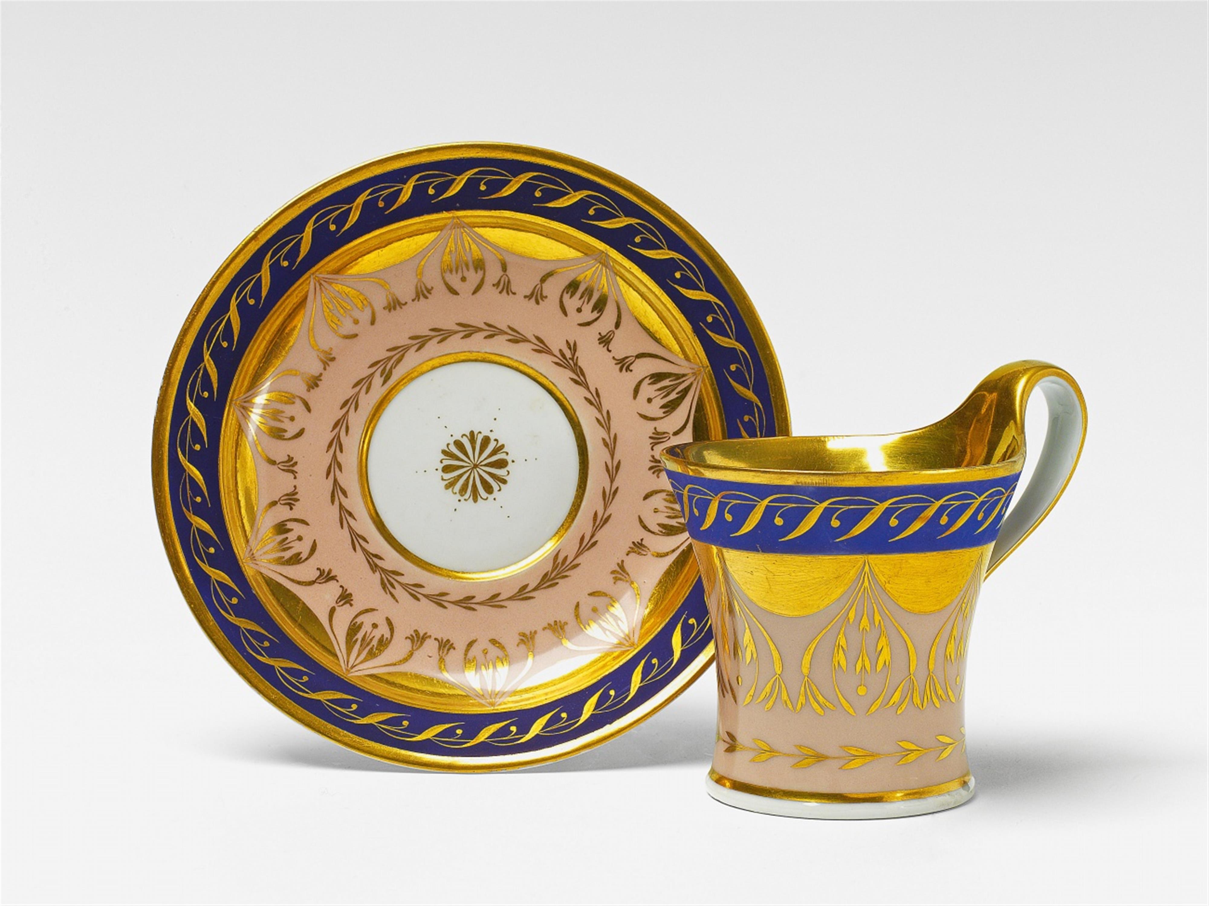 A Berlin KPM Neoclassical porcelain cup and saucer - image-1