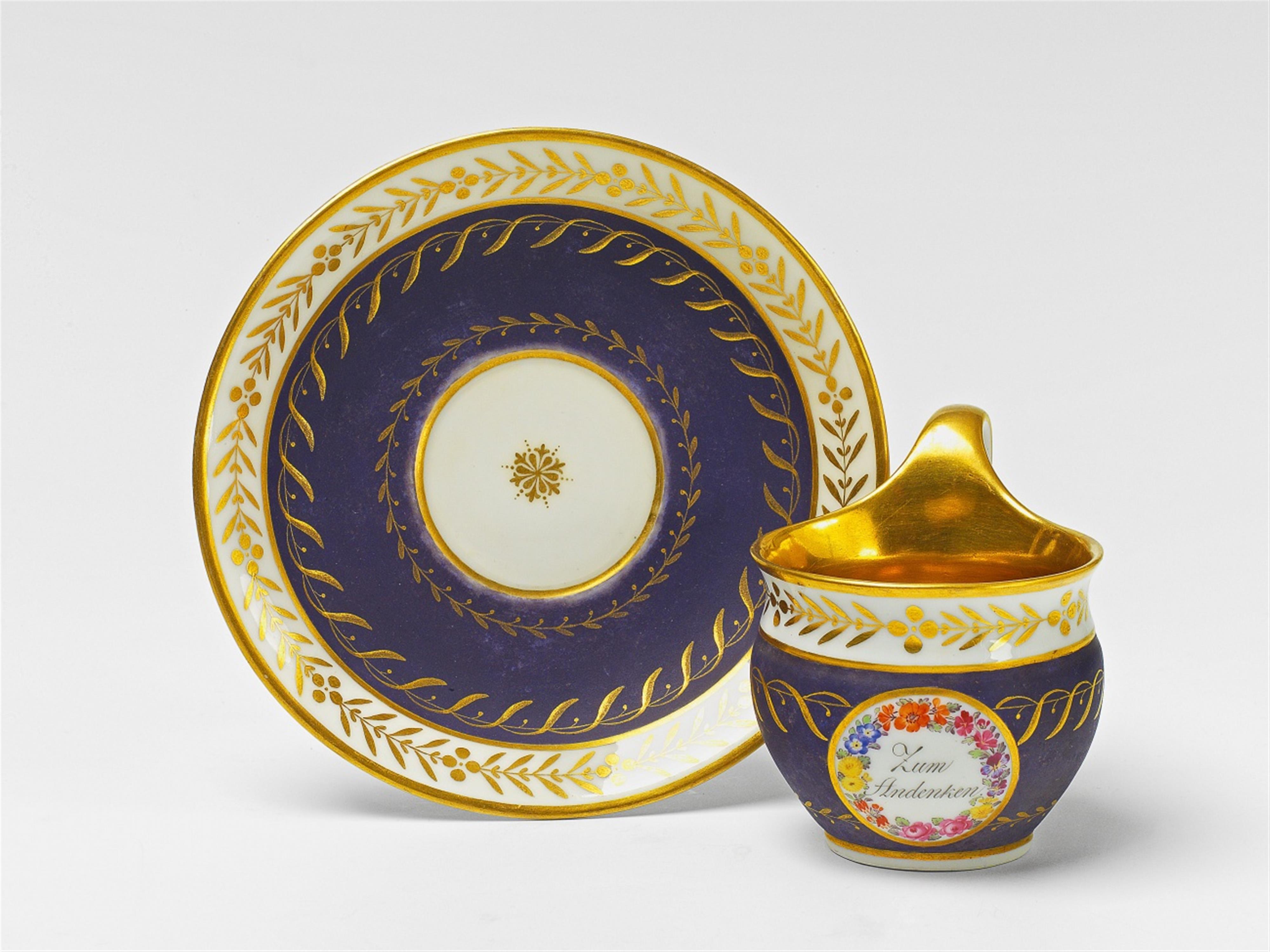 A Berlin KPM porcelain Biedermeier souvenir cup and saucer - image-1