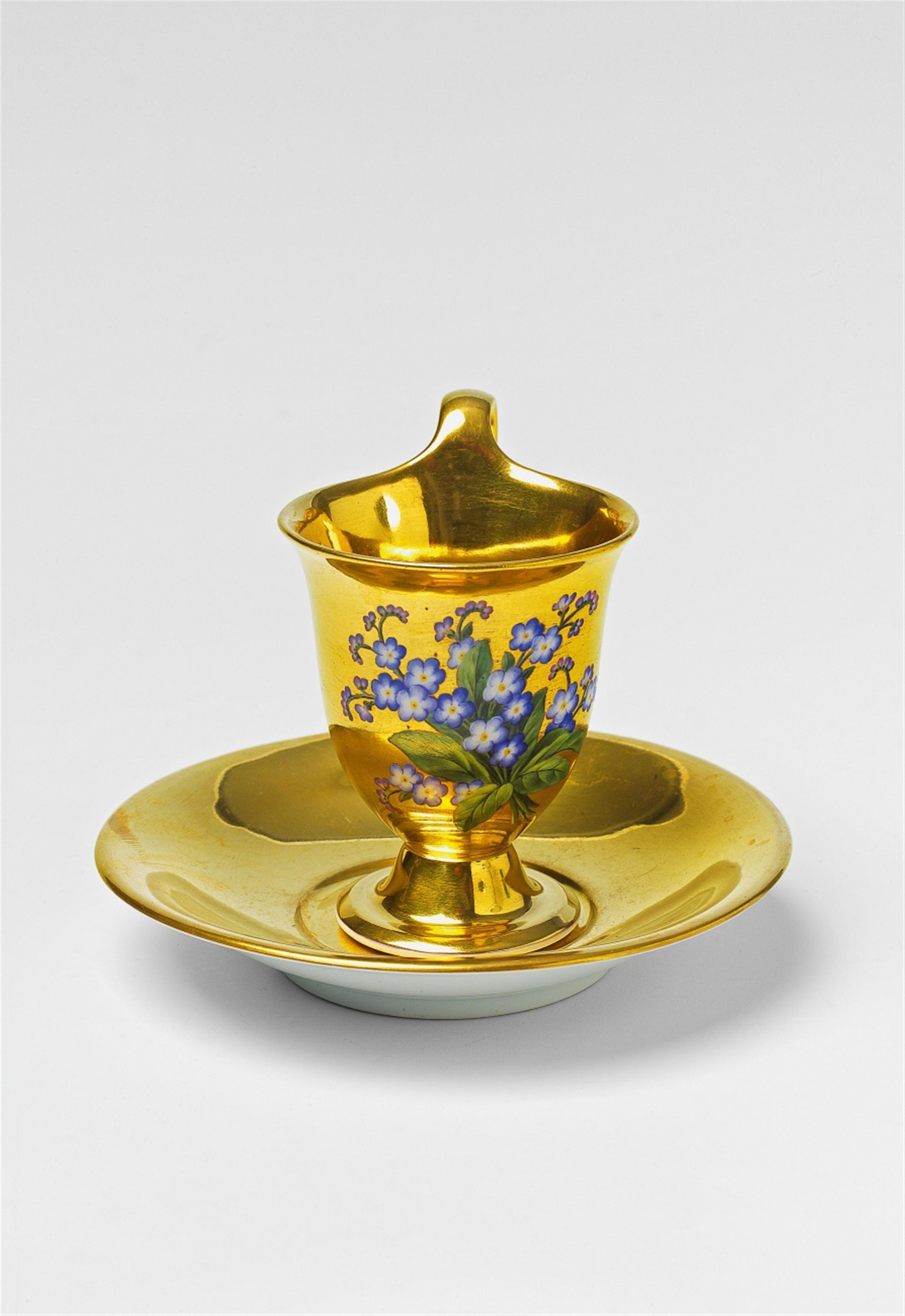 A Berlin KPM porcelain cup and saucer with forget-me-not decor - image-1