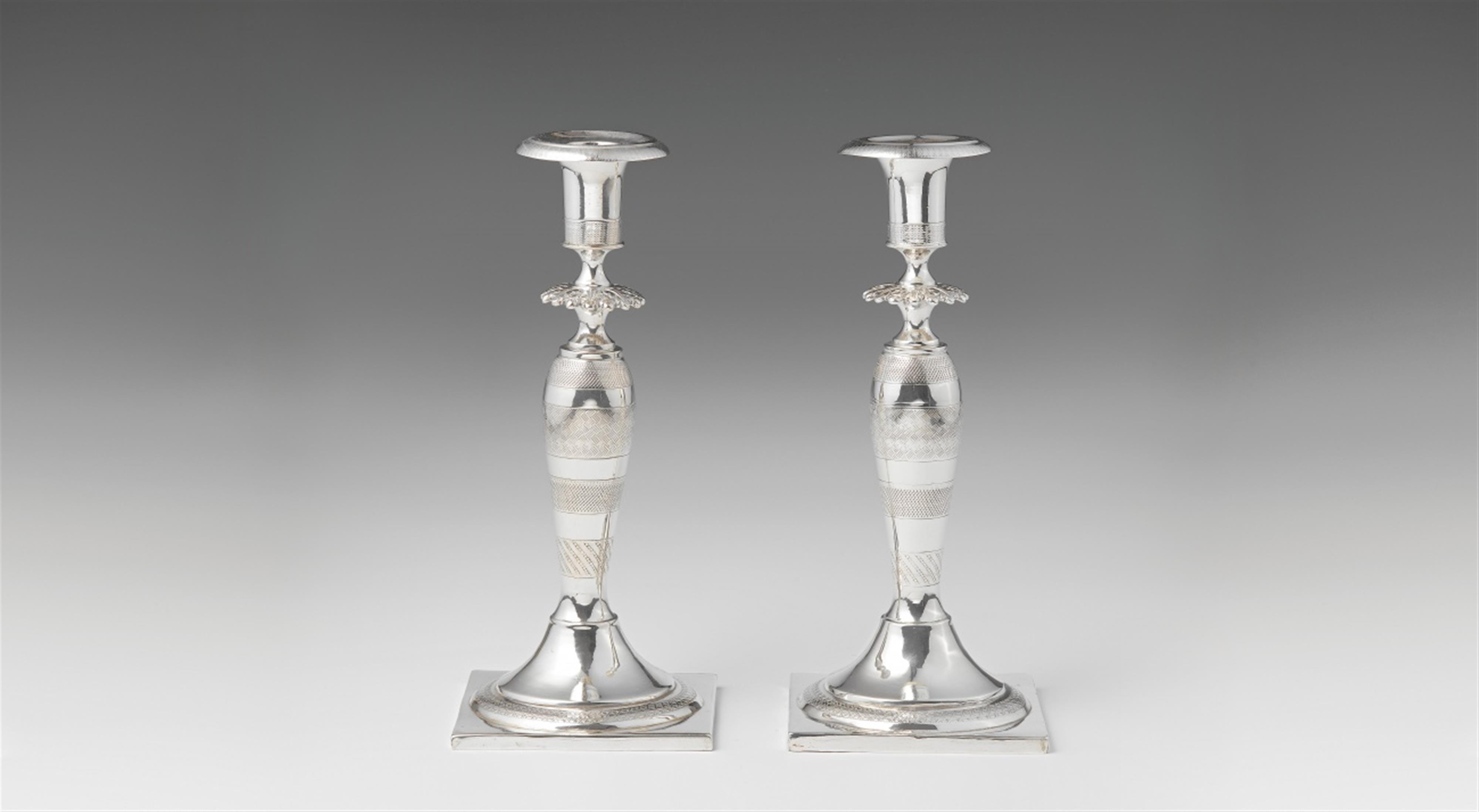 A pair of Berlin silver Biedermeier candlesticks - image-1