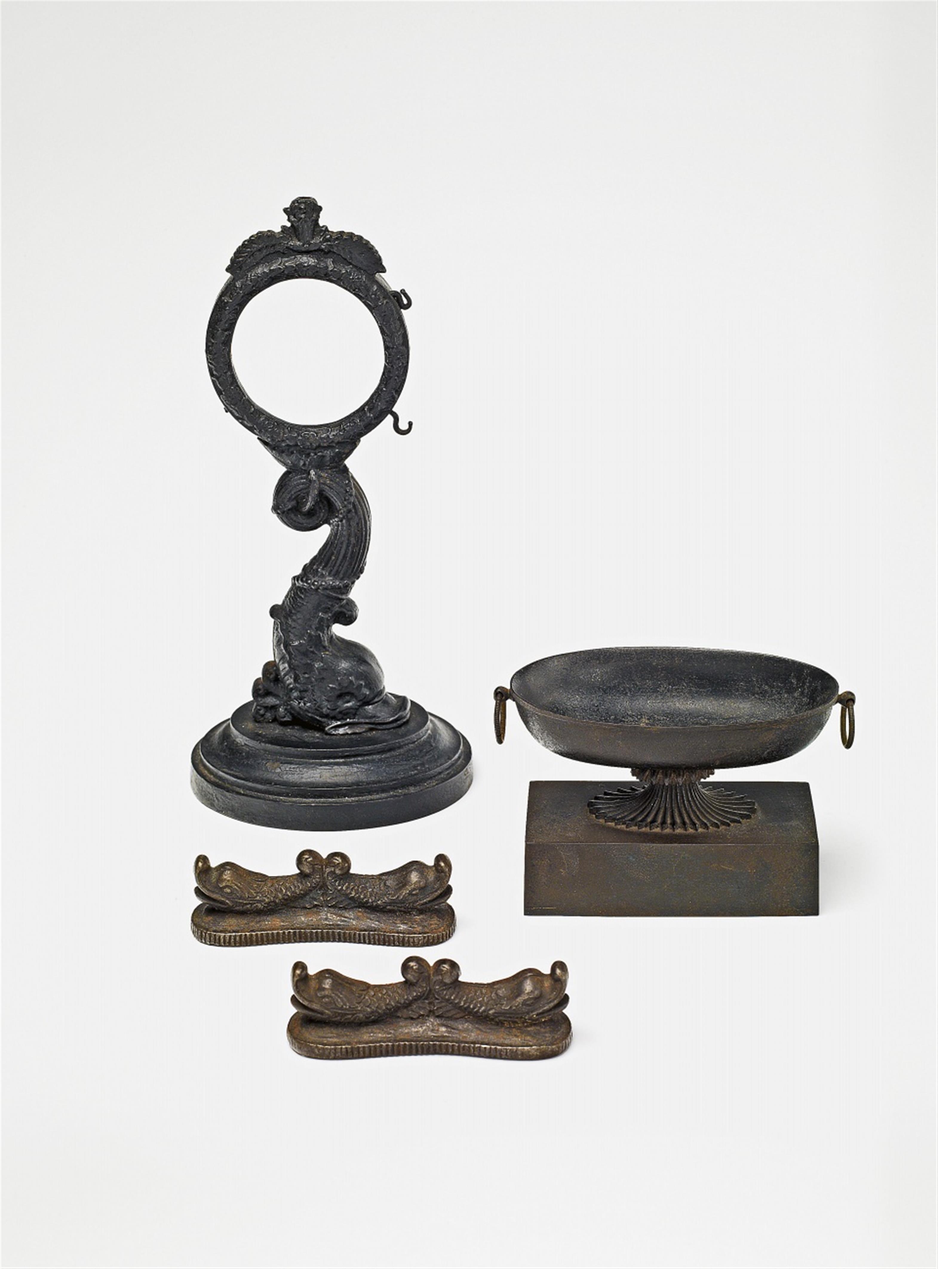 Four pieces of Gleiwitz cast iron ware - image-1